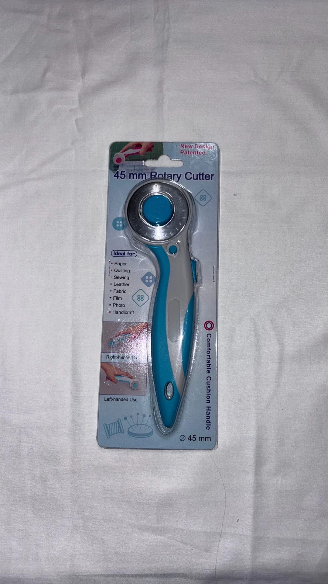 Product image for 0Brc Elan Rotary Cutter for Fabric & more Blue, takes 45mm blade, cushion handle