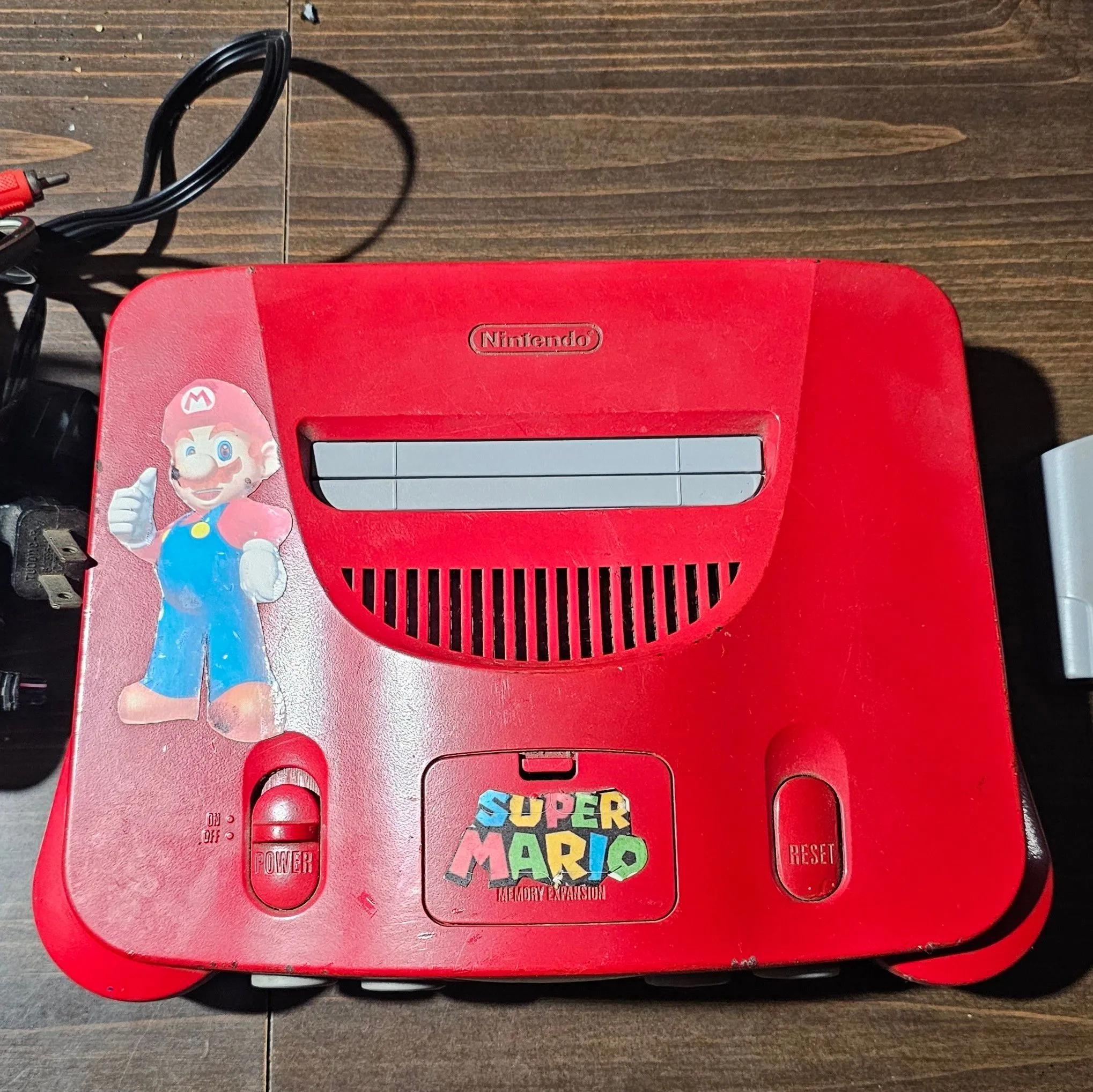 Product image for Nintendo 64 console. Cords included. Super Mario 64 included. No Controller.