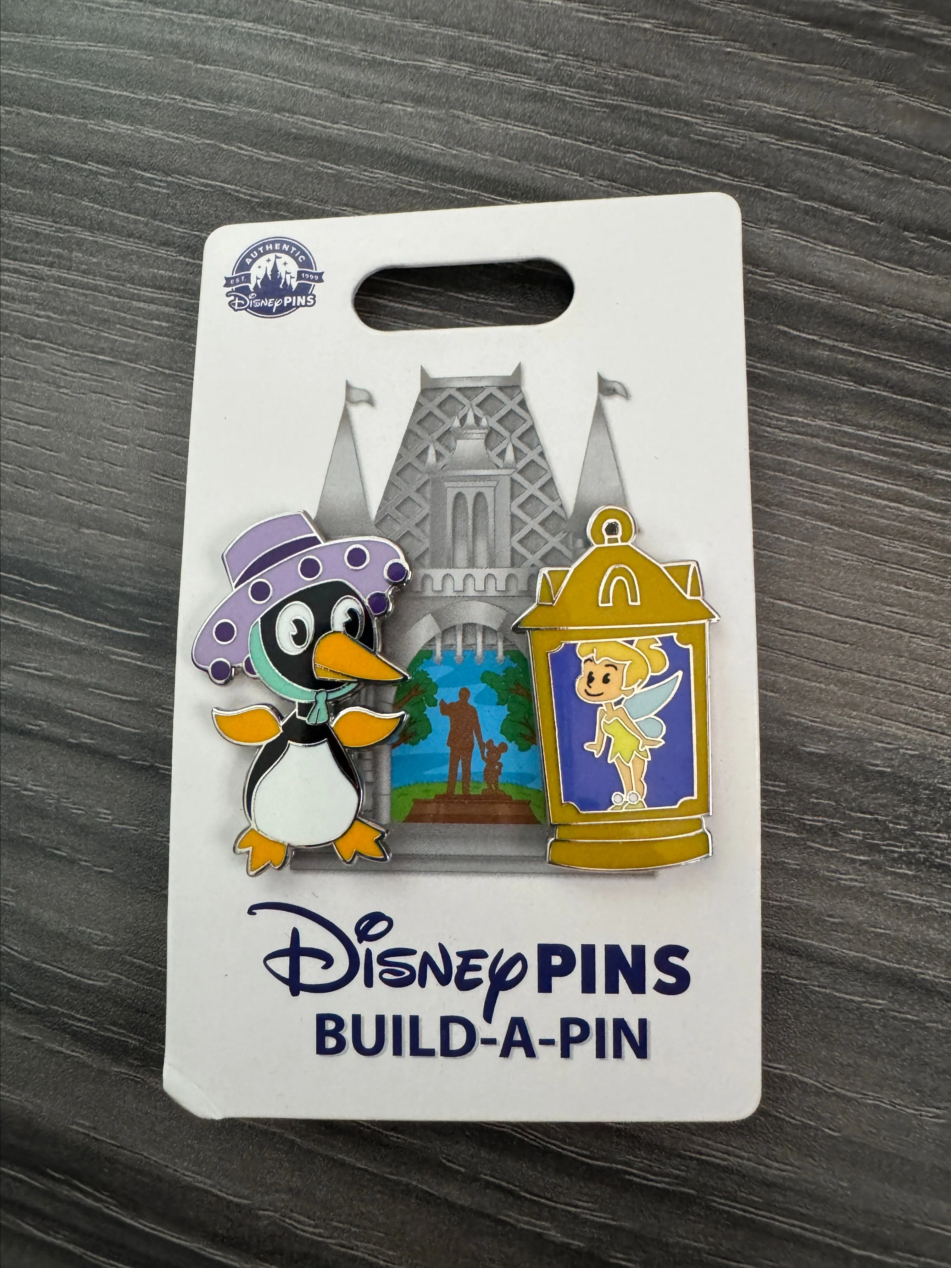 Product image for Disney 2024 Build-A-Pin Tinker Bell and Small World Penguin Pin Set