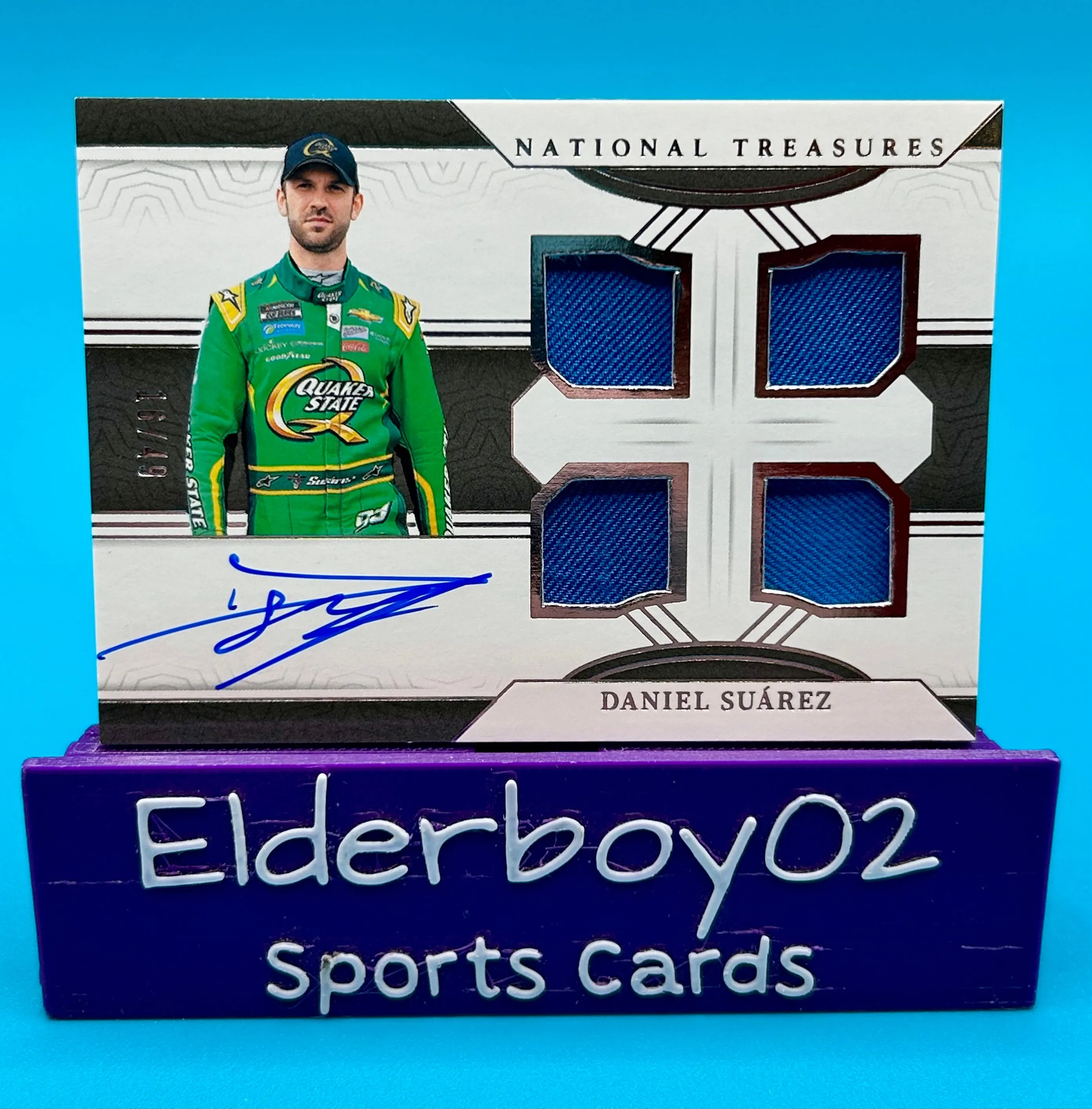 Product image for Daniel Suarez 16/49 Auto Firesuit Quad Race Gear Graphs 2024 Panini National Treasures Racing Nascar