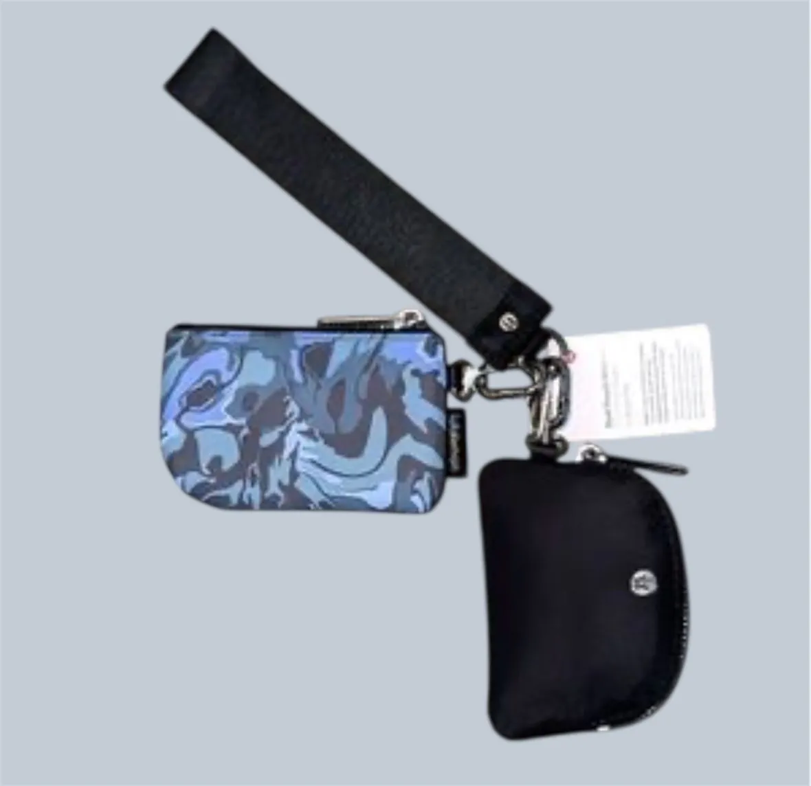Product image for NWT Lululemon Dual Pouch Wristlet Flower Meld Mini Multi/Gunmetal