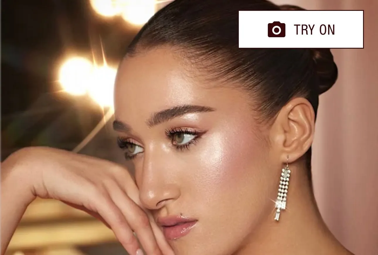 Product image for $49 Charlotte Tilbury Hollywood Glow Glide Face Architect Highlighter - No. Pillow Talk Glow