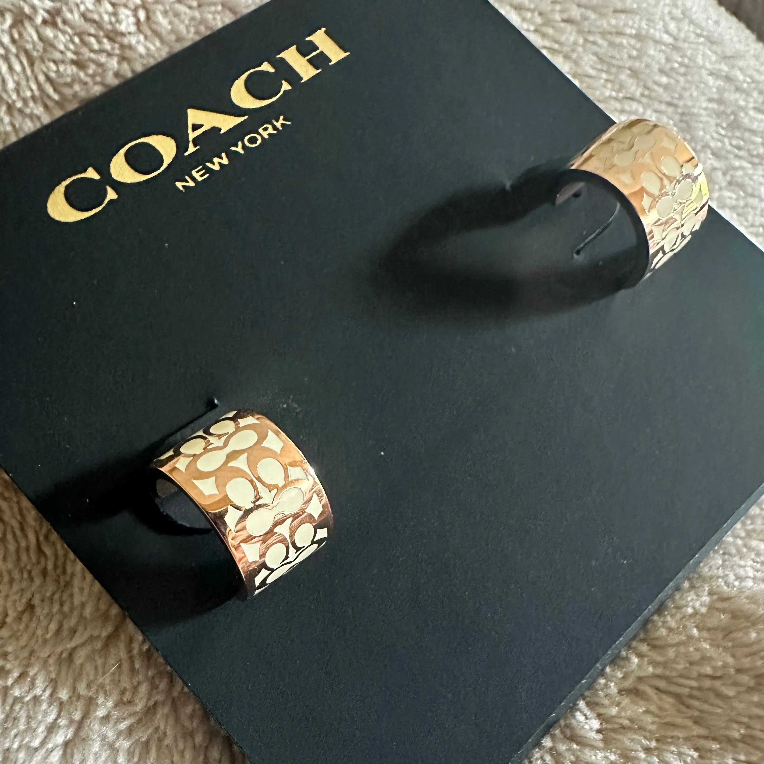 Product image for New Coach Rose Gold “C” White Logo Huggie Earrings – Signature Hoops MSRP $88