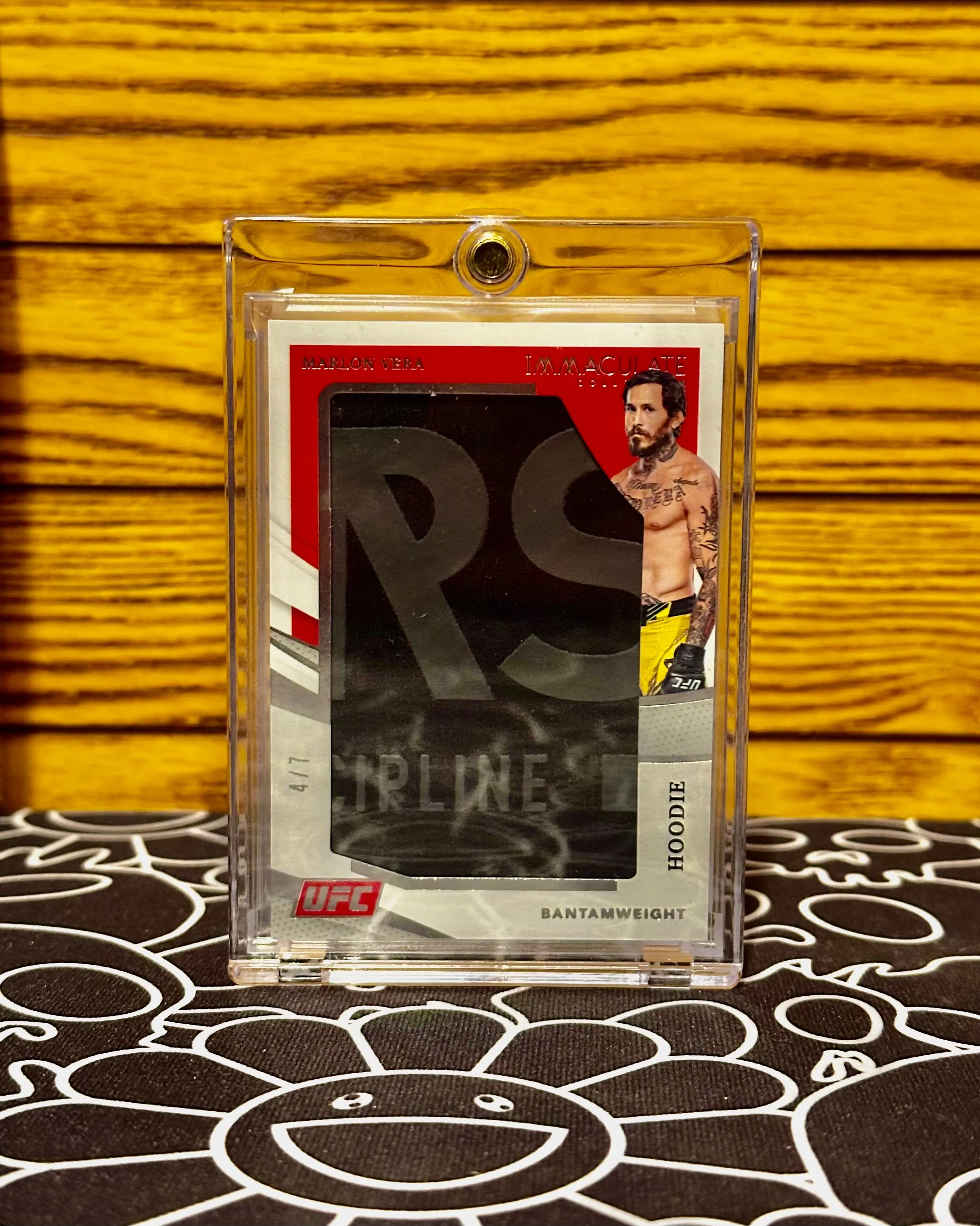 Product image for 2021 PANINI UFC IMMACULATE MARLON "CHITO" VERA HOODIE JUMBO MEM/RELIC 4/7