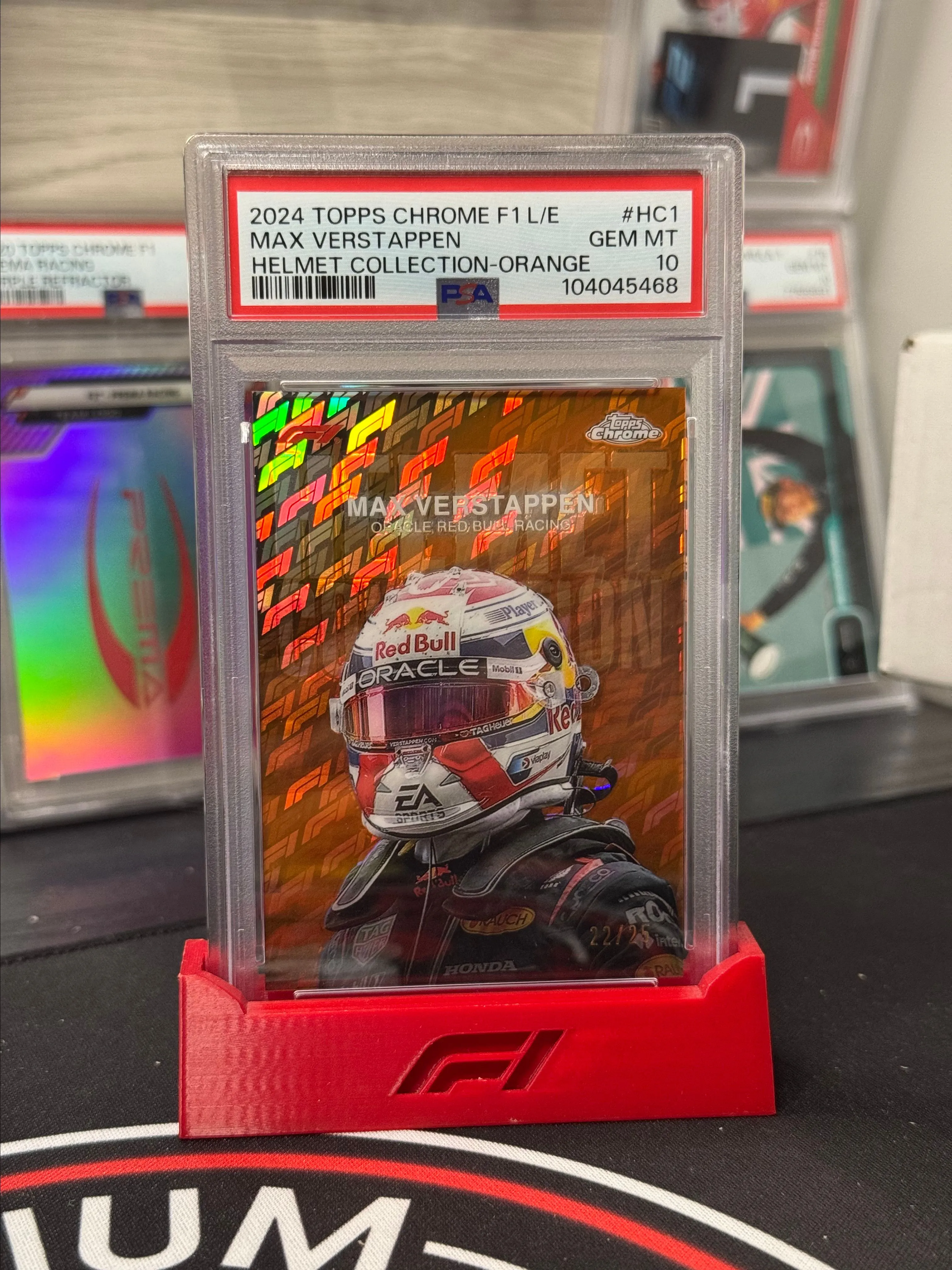 Product image for 2024 Topps Chrome Formula 1 Logofractor - Max Verstappen Orange Helmet /25 PSA 10