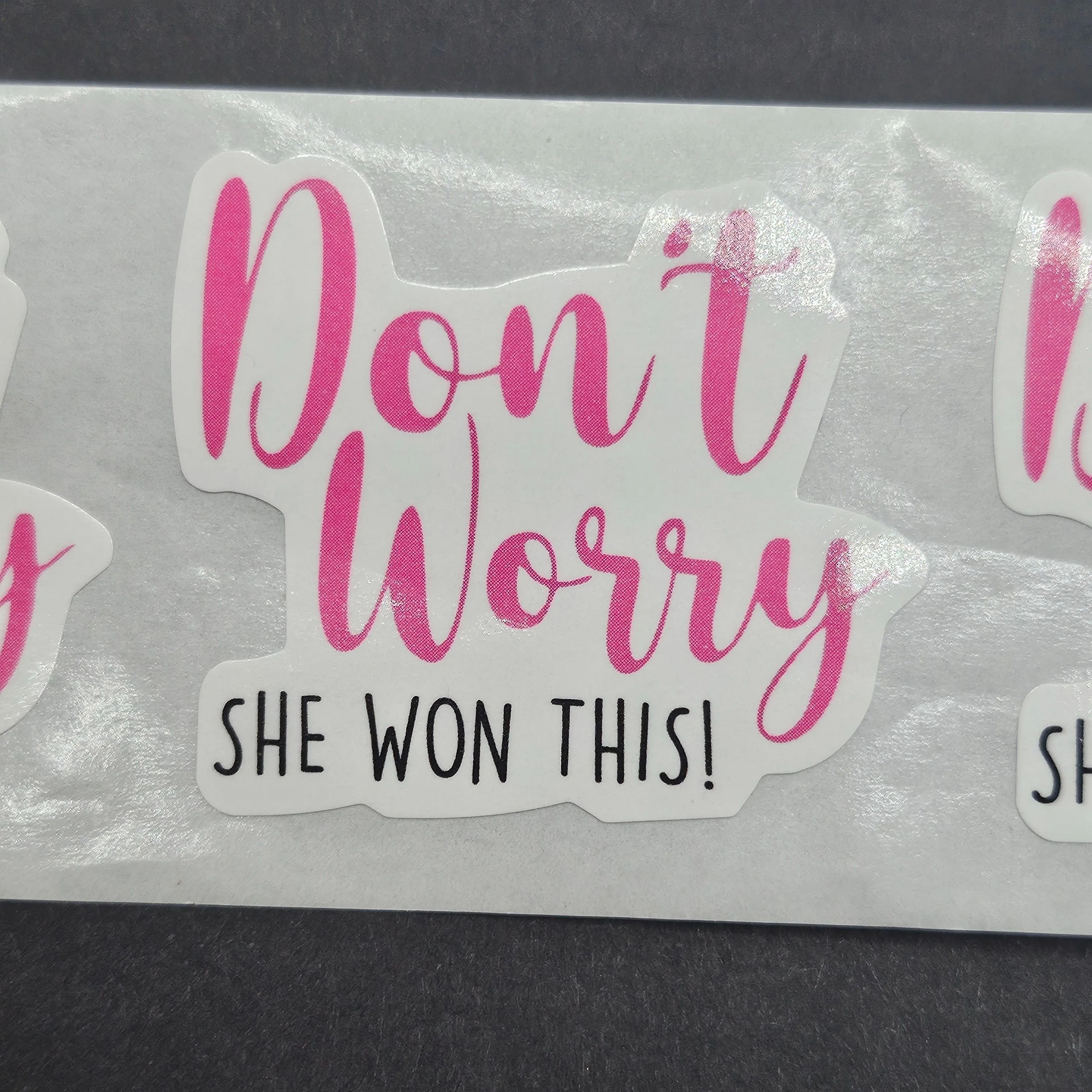 Product image for "Don't Worry She Won This" set of 10 stickers - 1.5" × 1.5" (roughly) 