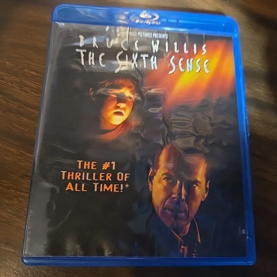 Product image for "The Sixth Sense" Blu-ray is a thrilling movie directed by M. Night Shyamalan, released in 1999. 