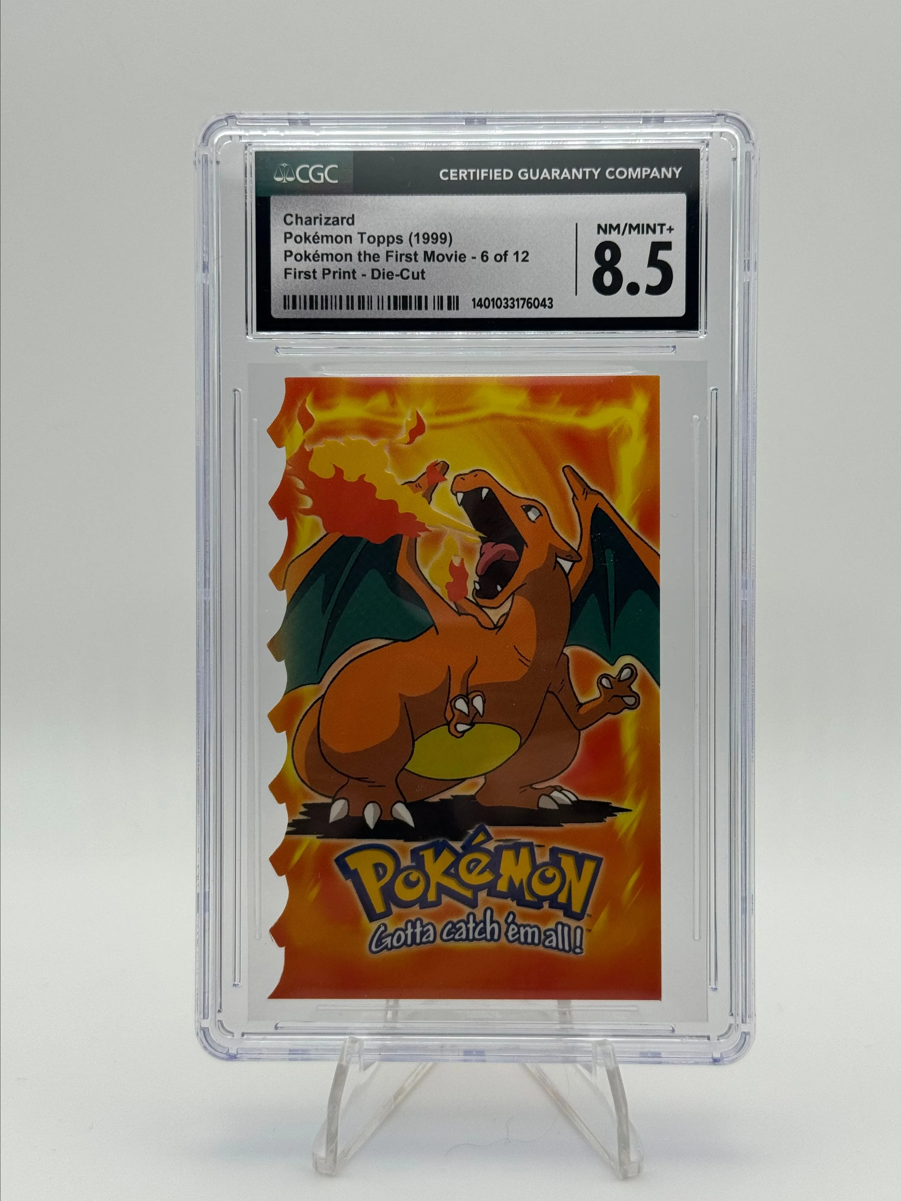 Charizard 1999 Topps Pokemon Movie Die Cut #6 - CGC 8.5 - First Print   Whatnot: Shop, Sell, Connect