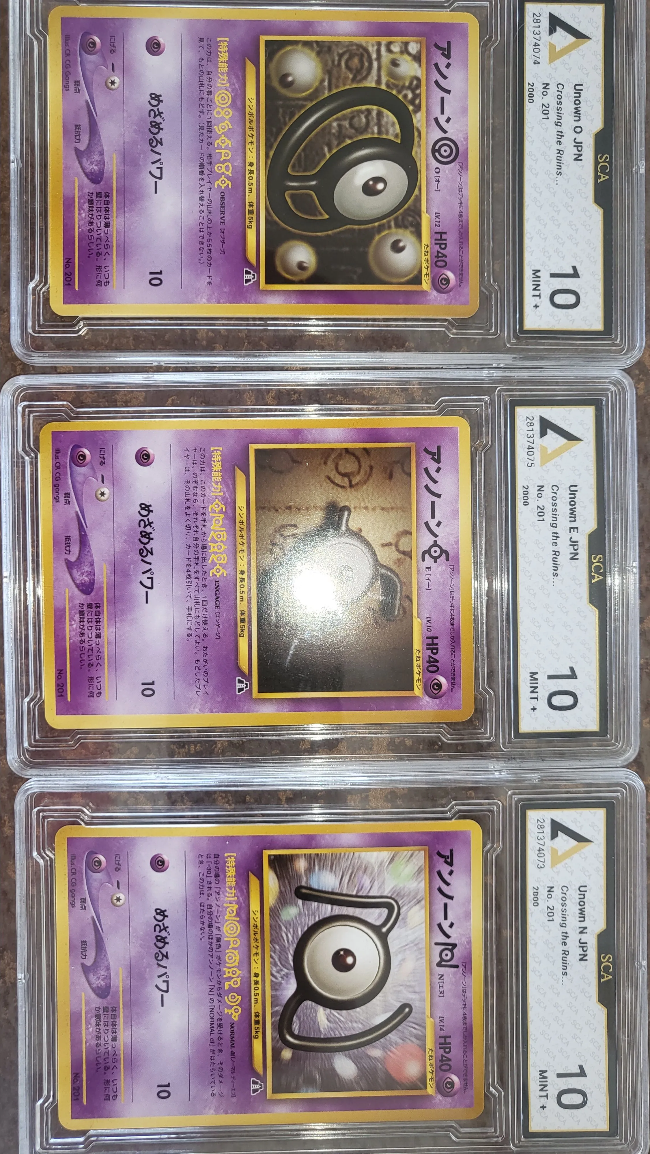 Product image for Lot des 3 Zarbis Neo file 2 crossing the ruins JAP gradé SCA 10