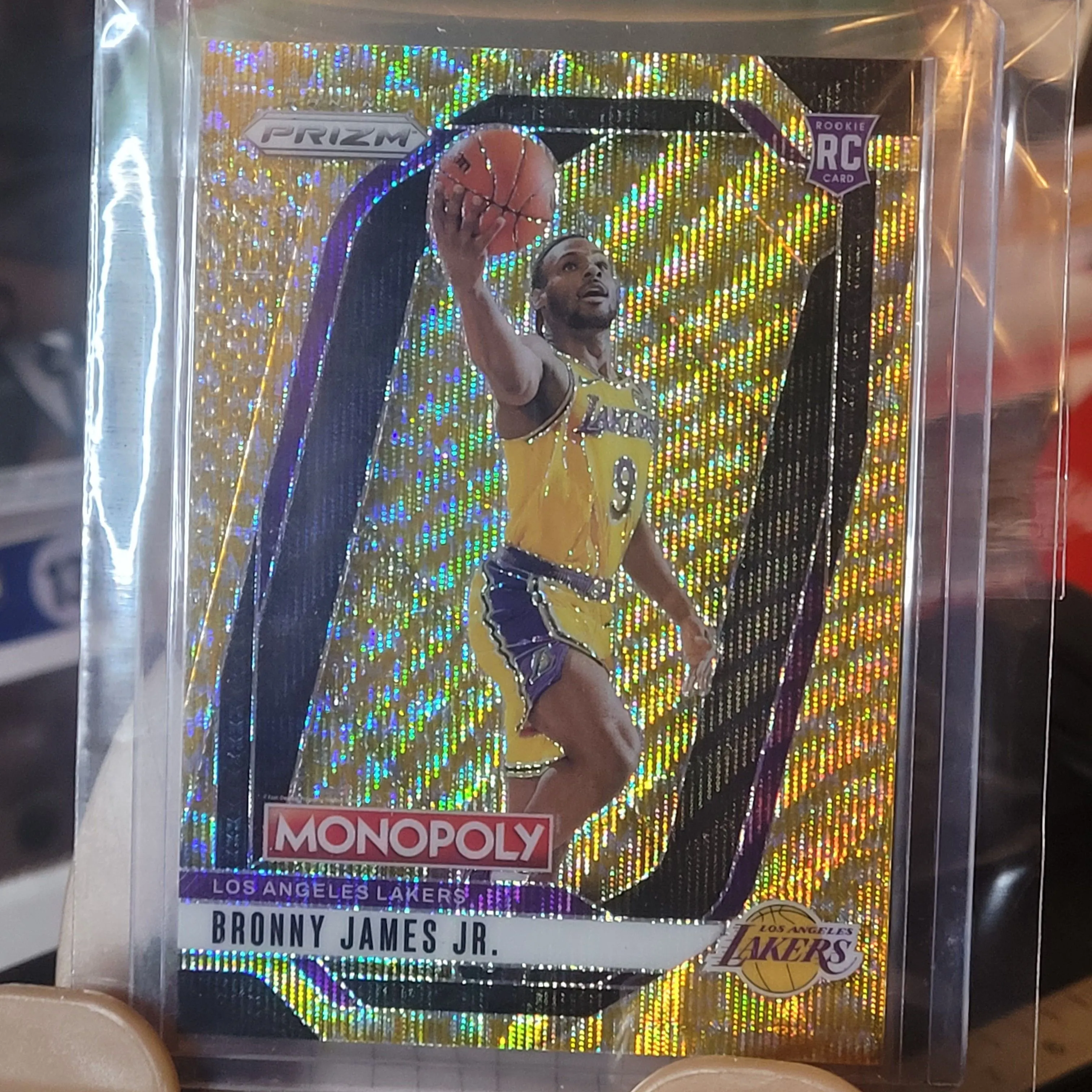 Product image for 1/10 2024-25 Prizm Monopoly Bronny James Jr No. 45 Gold Shockwave Millionaire 1/10 RC