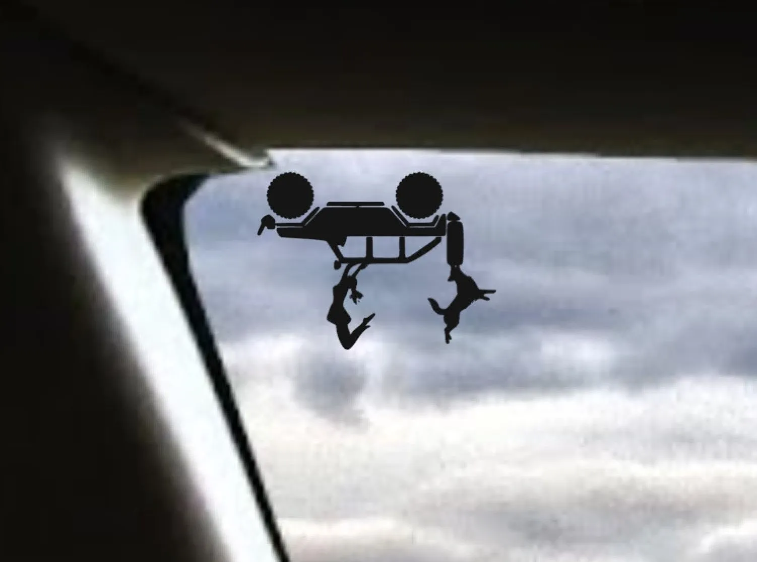 Product image for Girl and dog falling from 4 door suv decal - windshield Easter egg for Jeep Wrangler