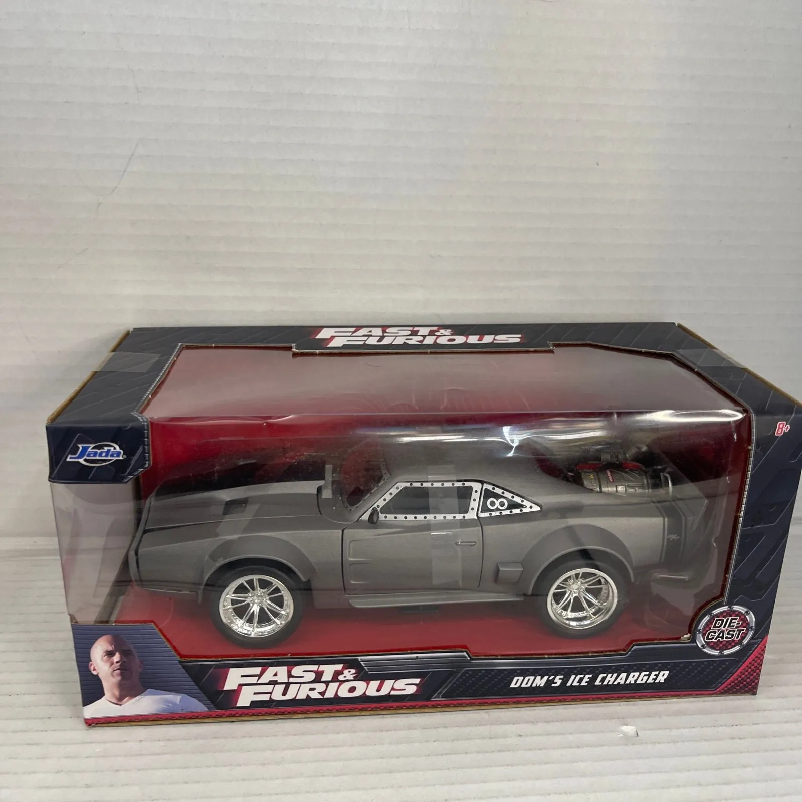 Product image for Jada Toys Fast & Furious 1:24 Dom's Ice Charger Die-cast Car, Toys for Kids...