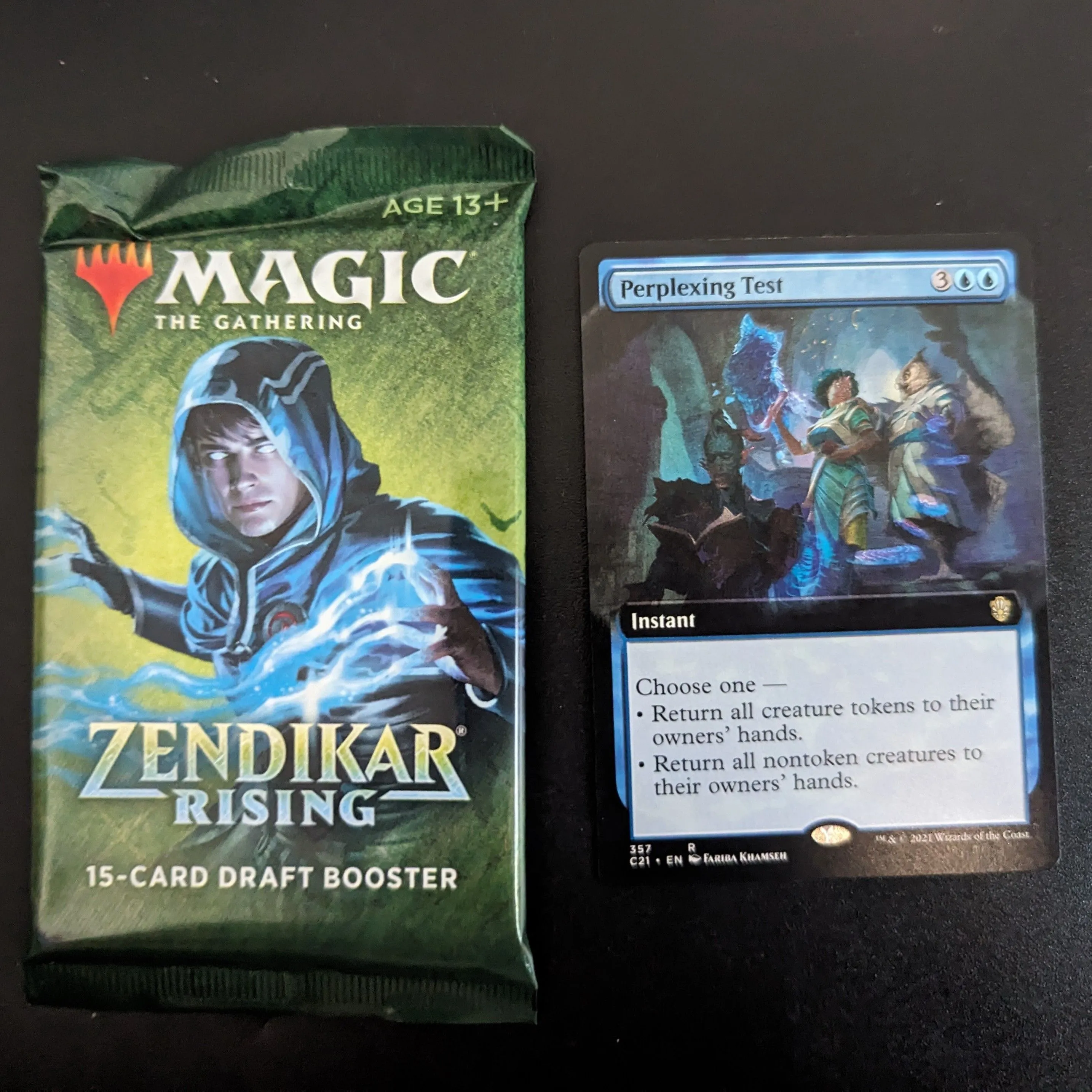 Product image for Perplexing Test (Extended Art) and Zendikar Rising Draft Booster
