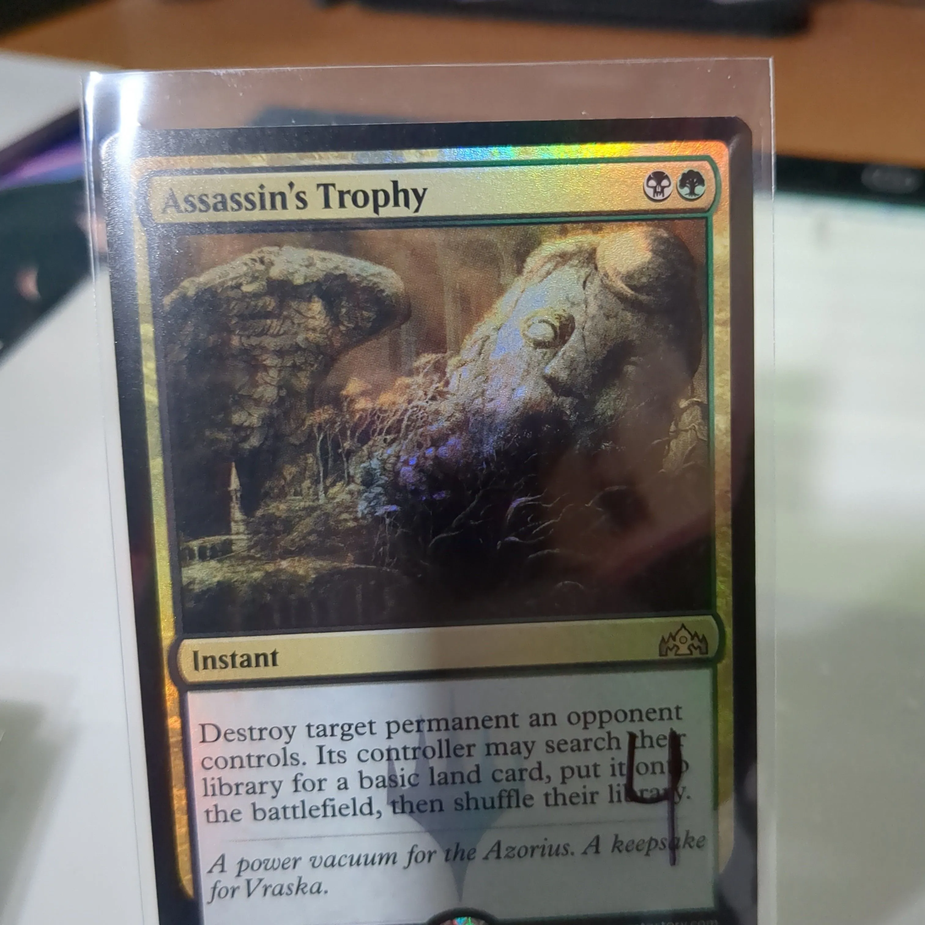 Product image for assassin's trophy - foil