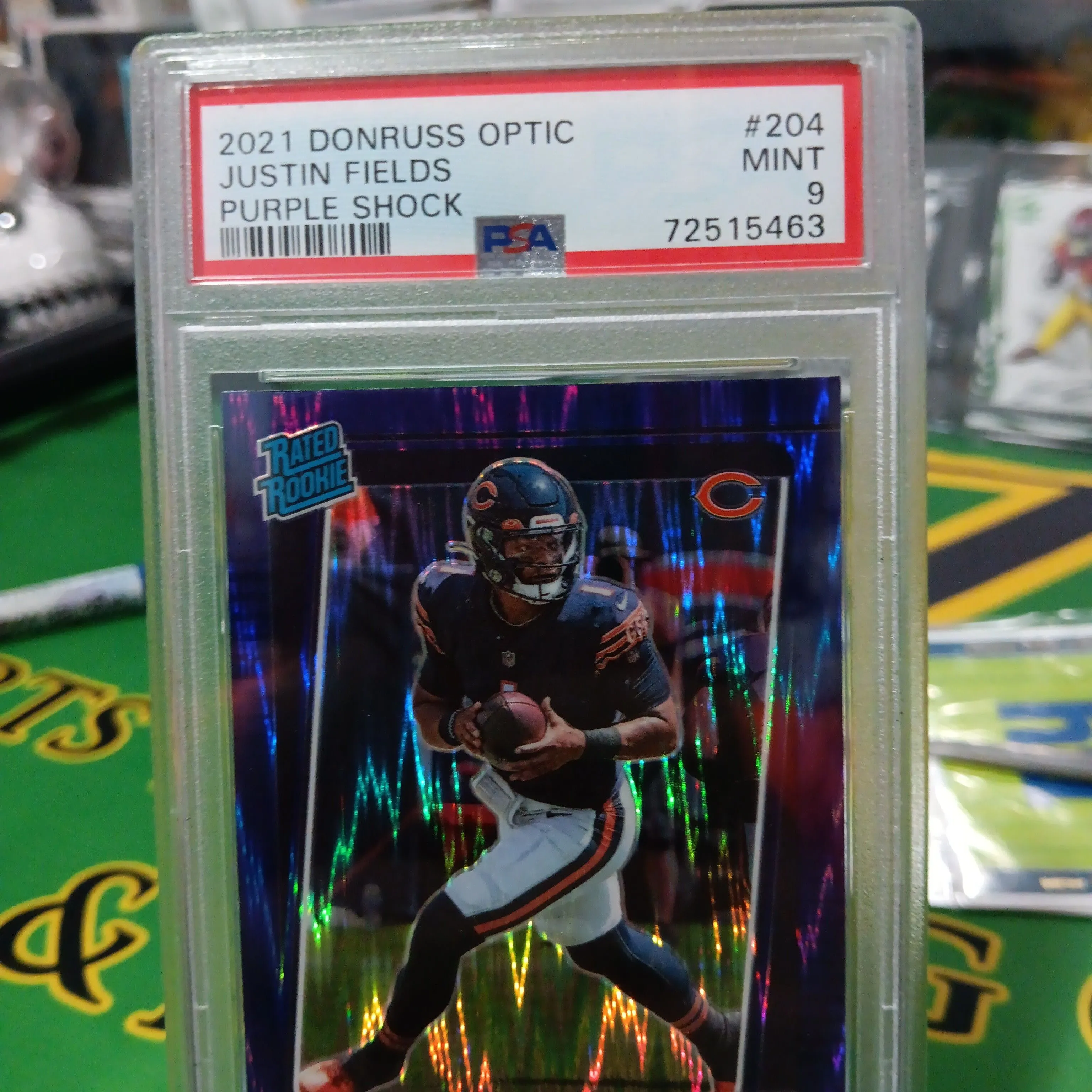 Product image for 2021 Panini Donruss Optic Justin Fields 204 Purple Shock PSA MINT 9