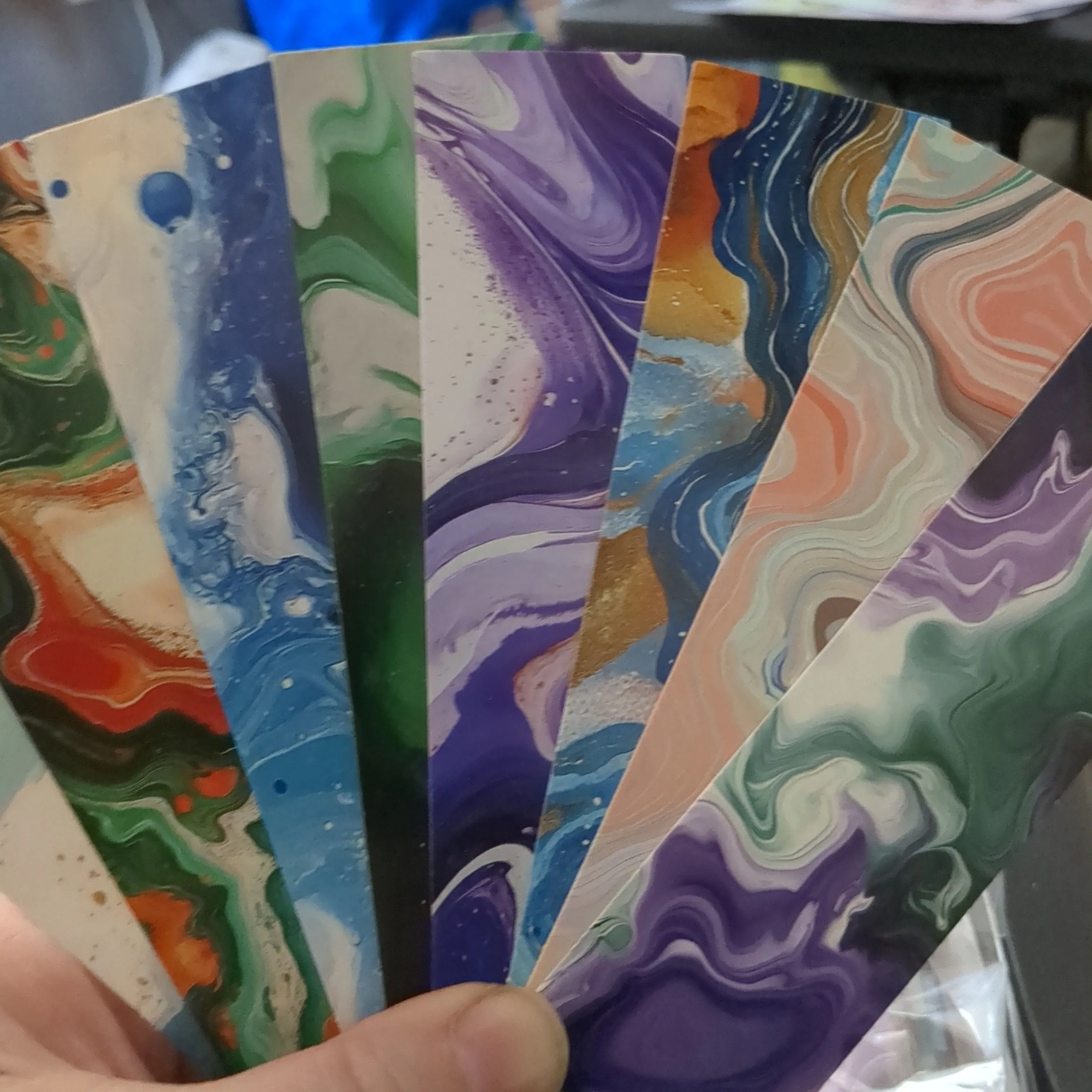 Product image for CHEAP ASS SHIPPING!! ONE marbled oil spill design bookmark