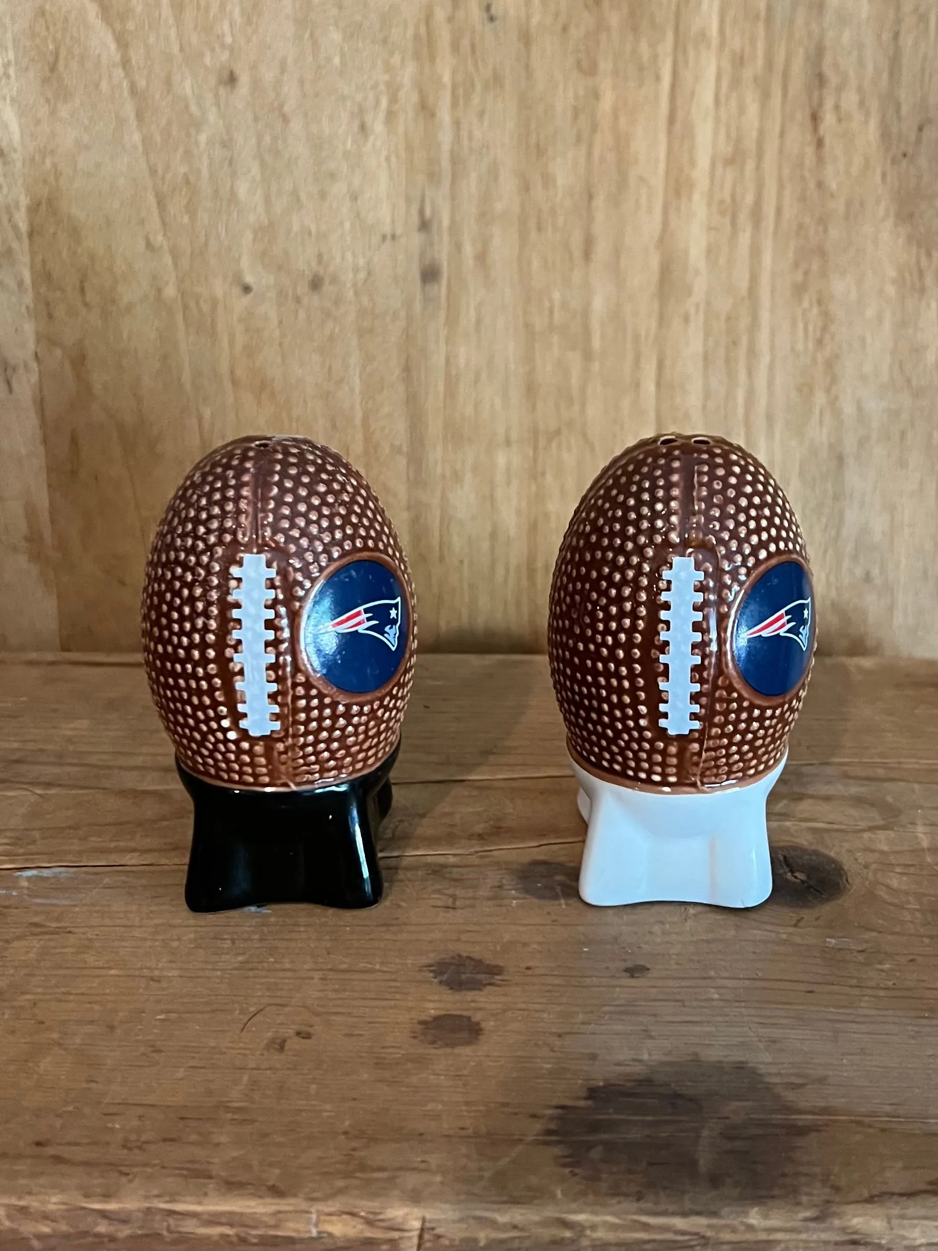 Product image for 41-MJ. Patriots football salt + pepper shakers