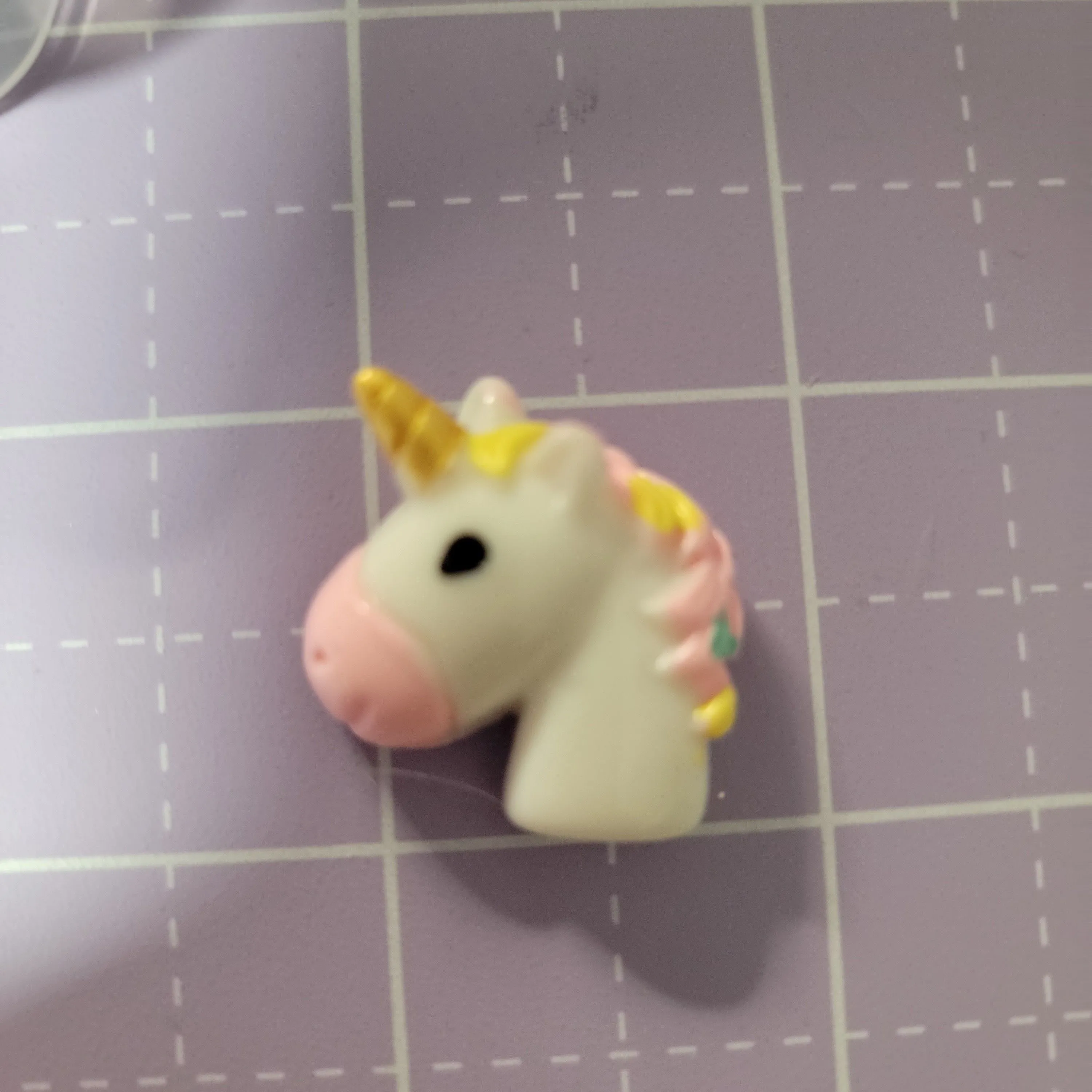Product image for Unicorn cover minder