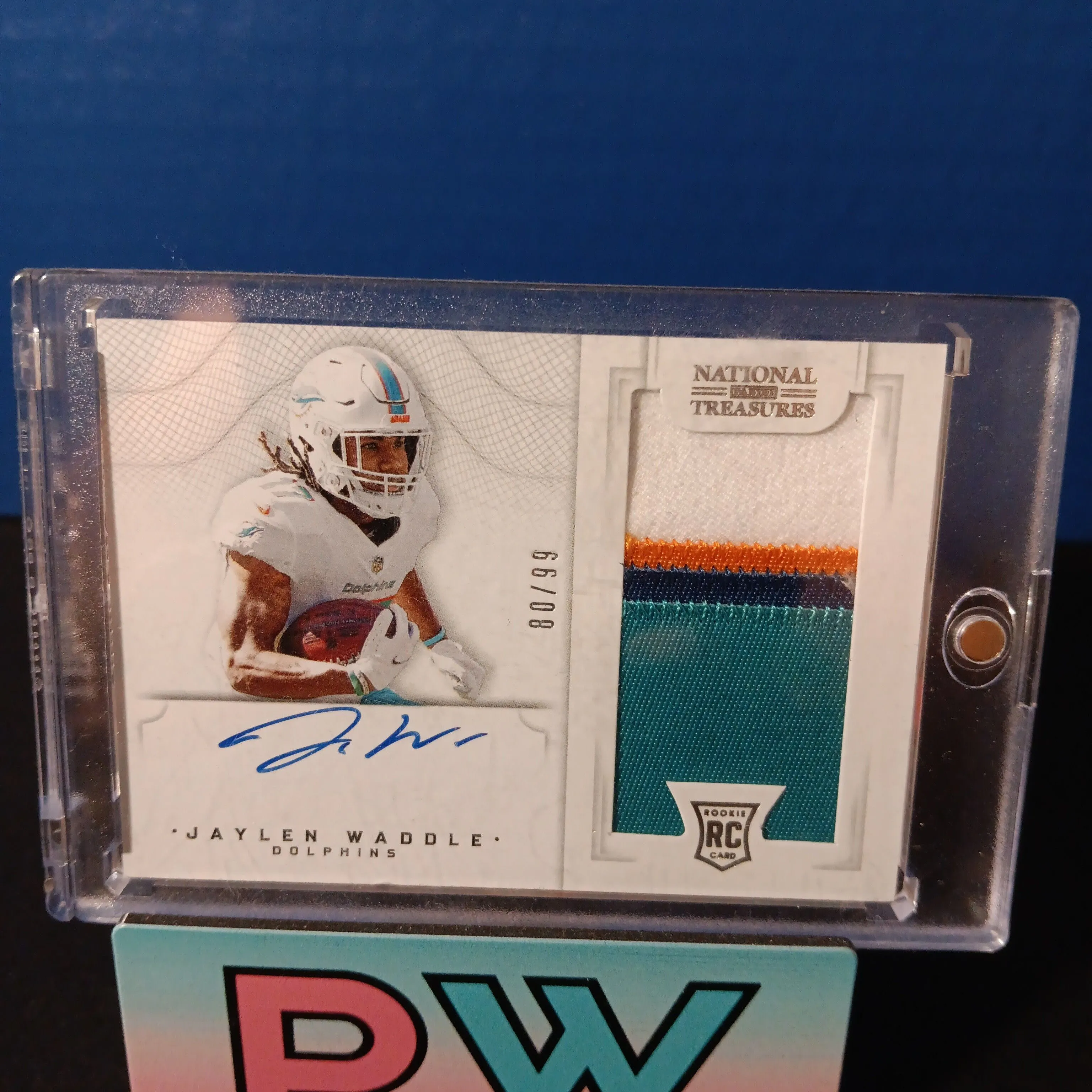 Product image for Jaylen waddle rpa /99 National Treasures  4 color patch on card