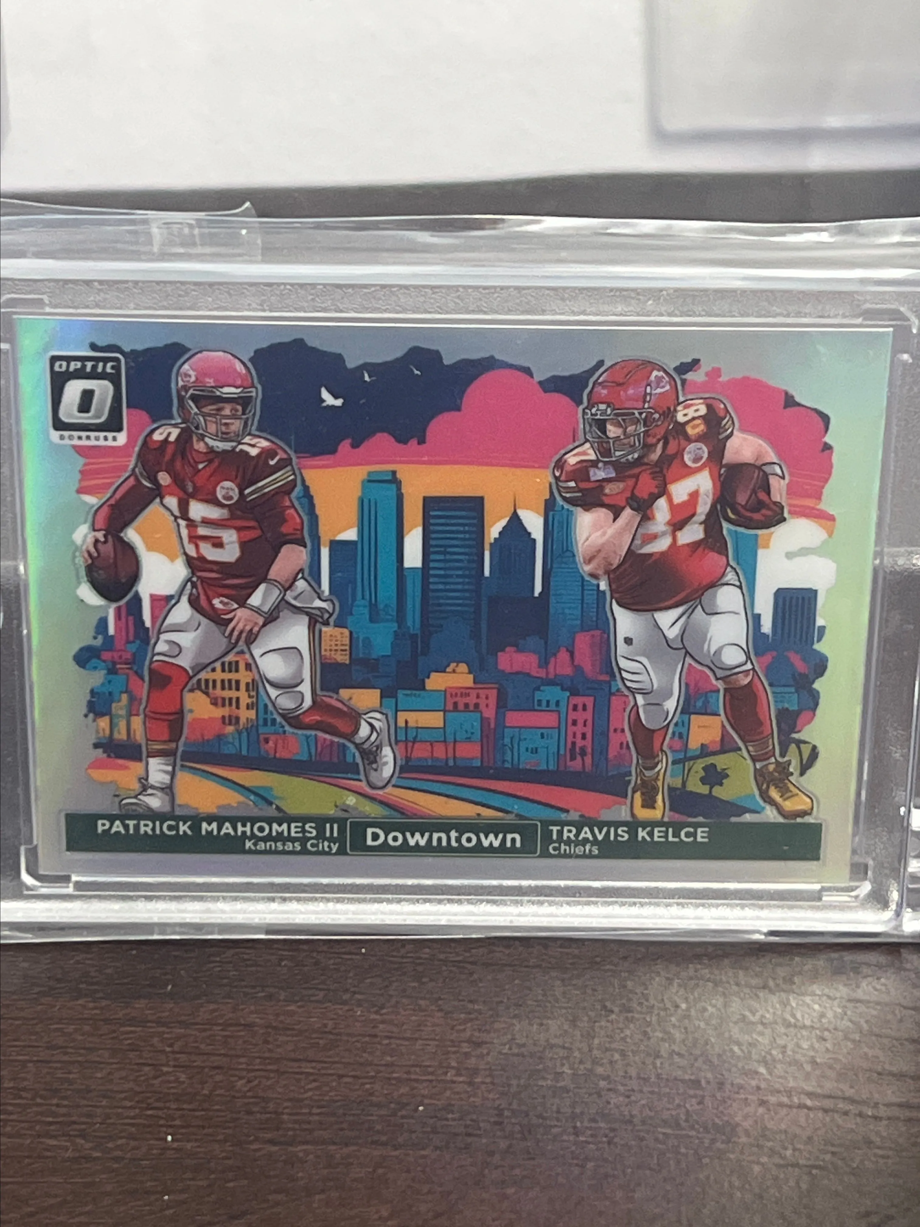 Product image for 2024 Optic Patrick Mahomes II & Travis Kelce Dual Downtown SSP CASE HIT Chiefs