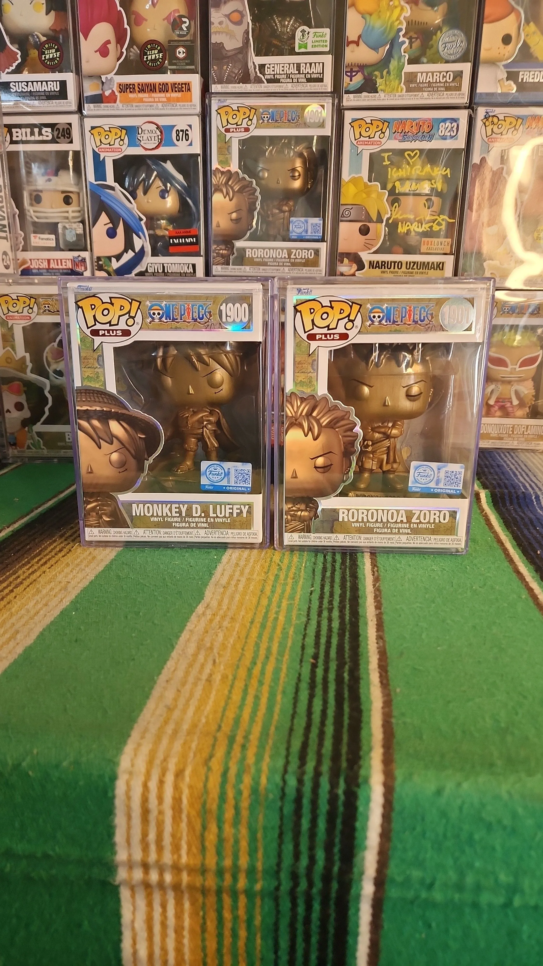 Product image for Luffy and Zoro Bronze Statue Bundle In Hand!