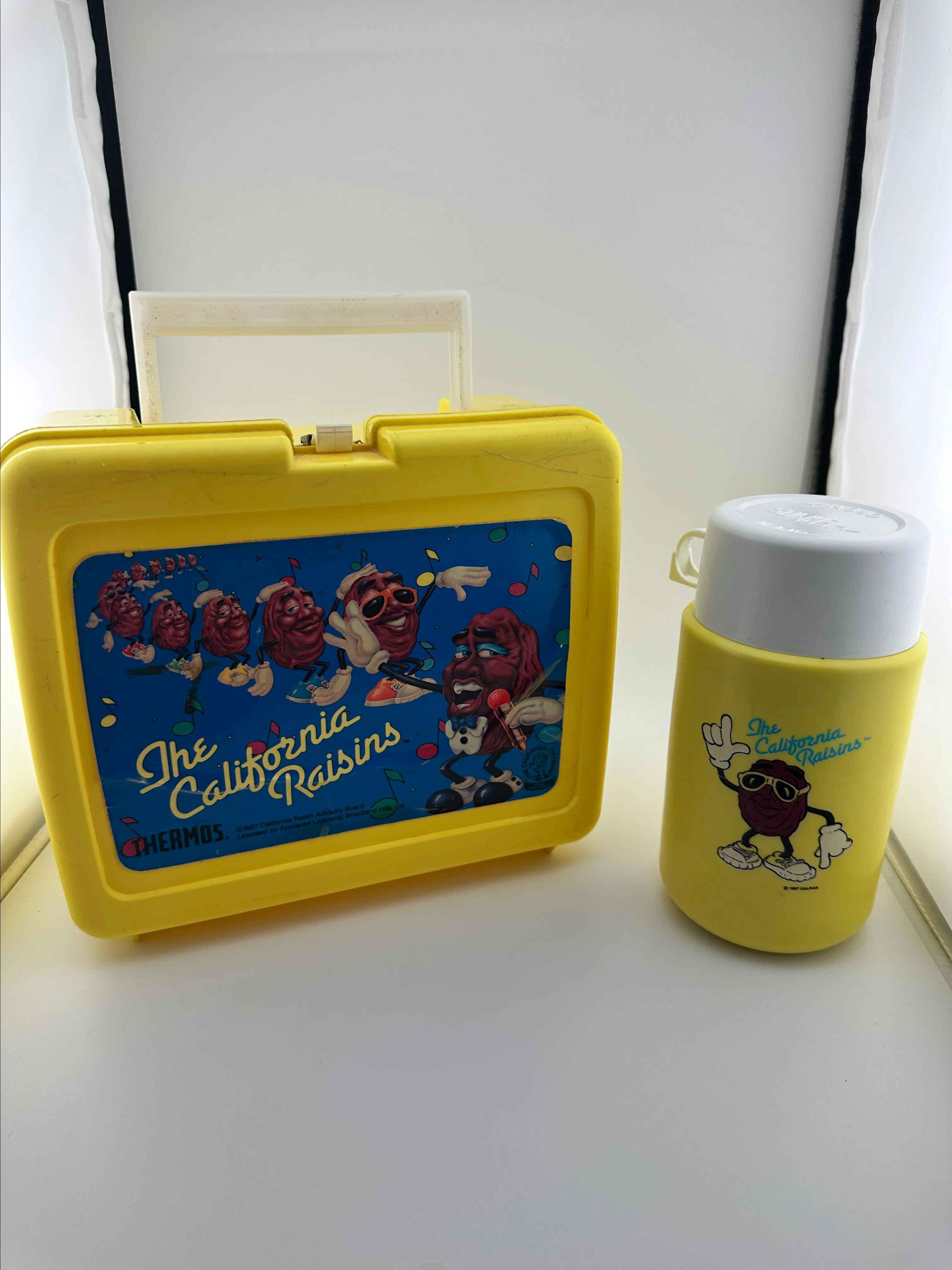 Product image for Vintage The California Raisns Yellow Lunch Box and Thermos