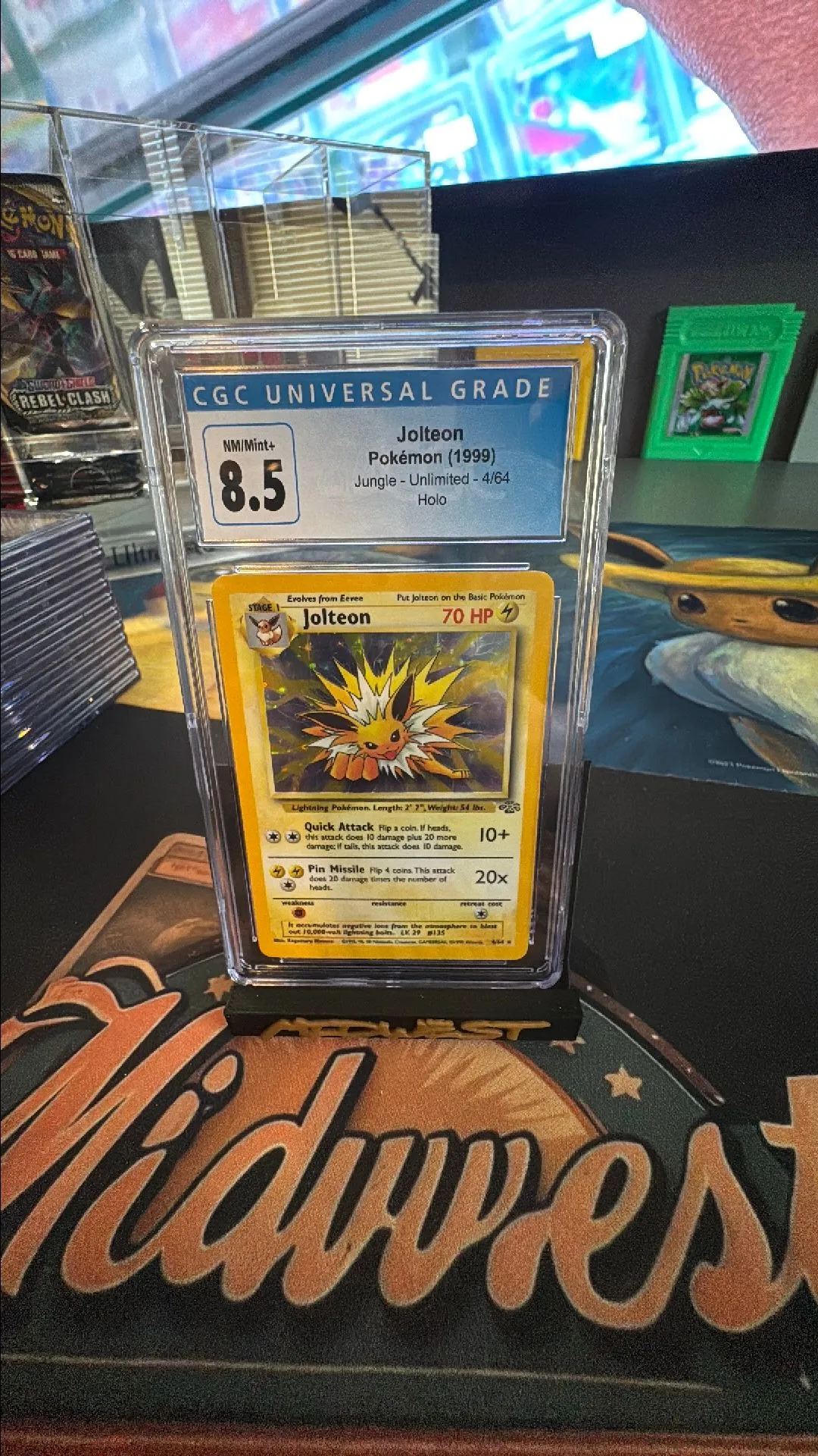 Product image for CGC 8.5 Jolteon Jungle Unlimited Holo