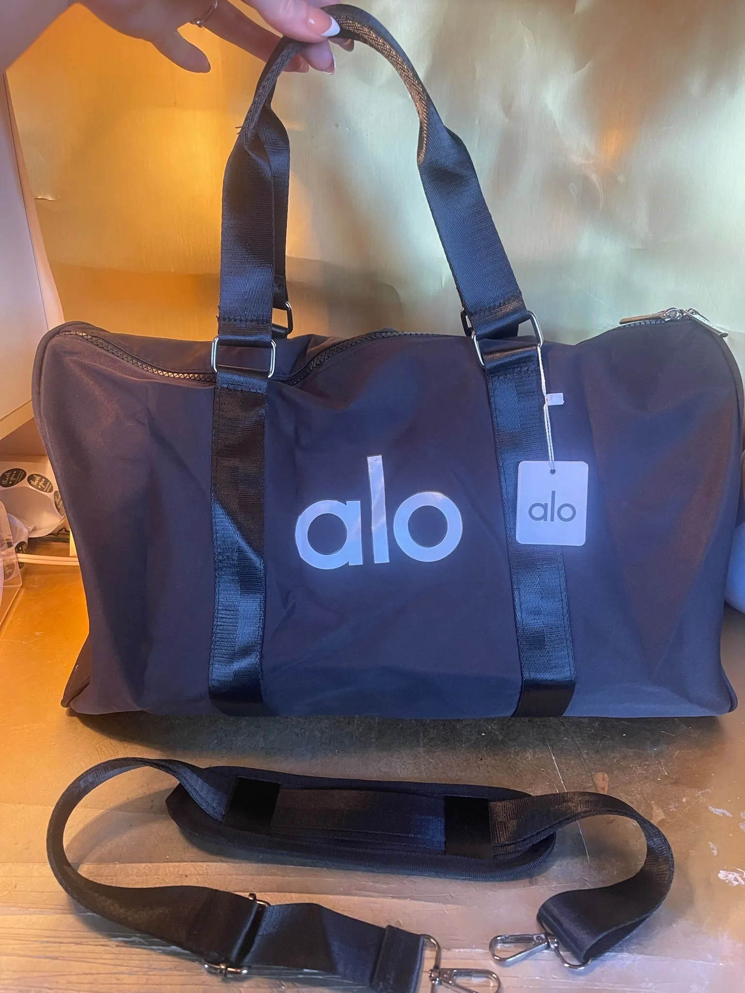 Alo yoga gym duffle bag NWT  Whatnot: Shop, Sell, Connect