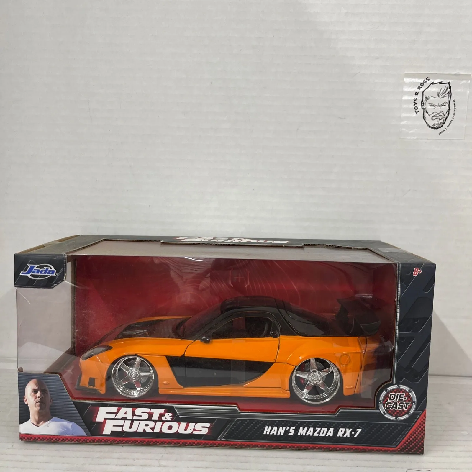 Product image for Han's Mazda RX-7 Orange and Black Fast & Furious Movie 1/24 Diecast Model Car by