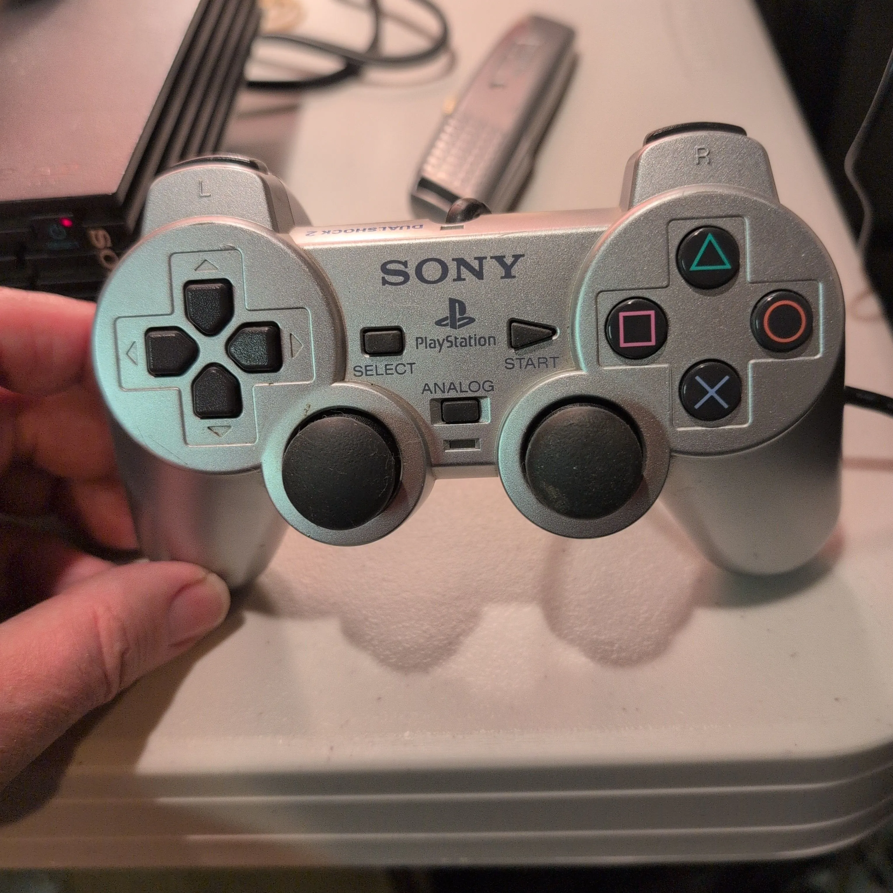 Product image for PlayStation 2 silver Dualshock 2 controller. tested 