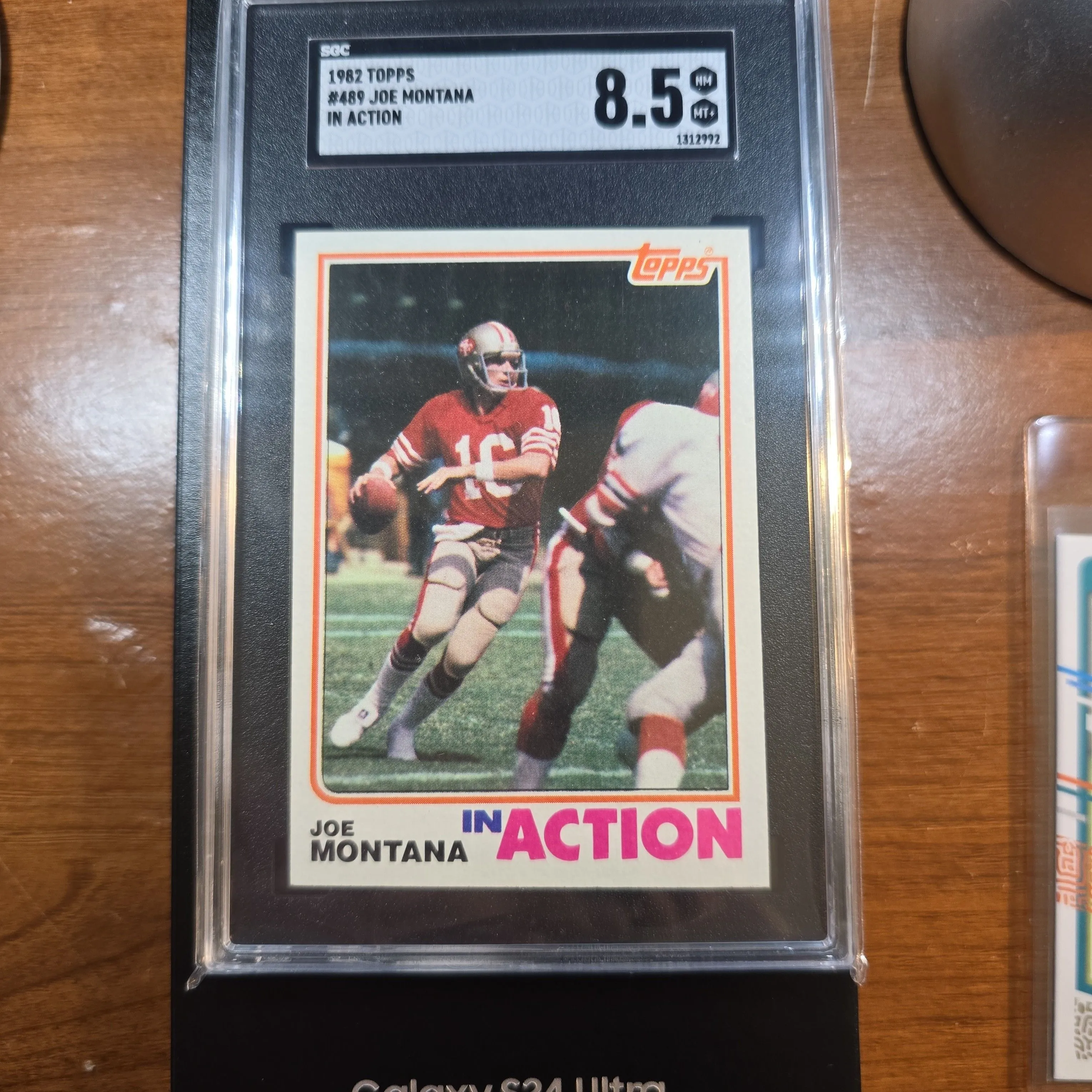 Product image for 1982 Topps Joe Montana SGC In Action 8.5