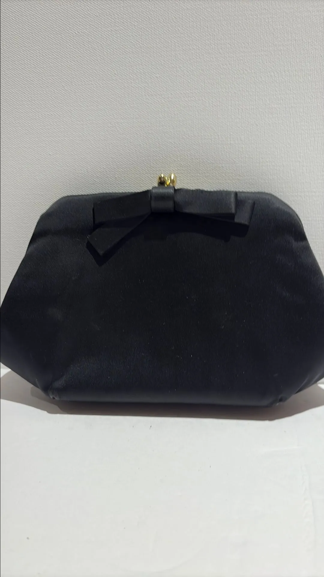 Product image for Black satin clutch with both detail