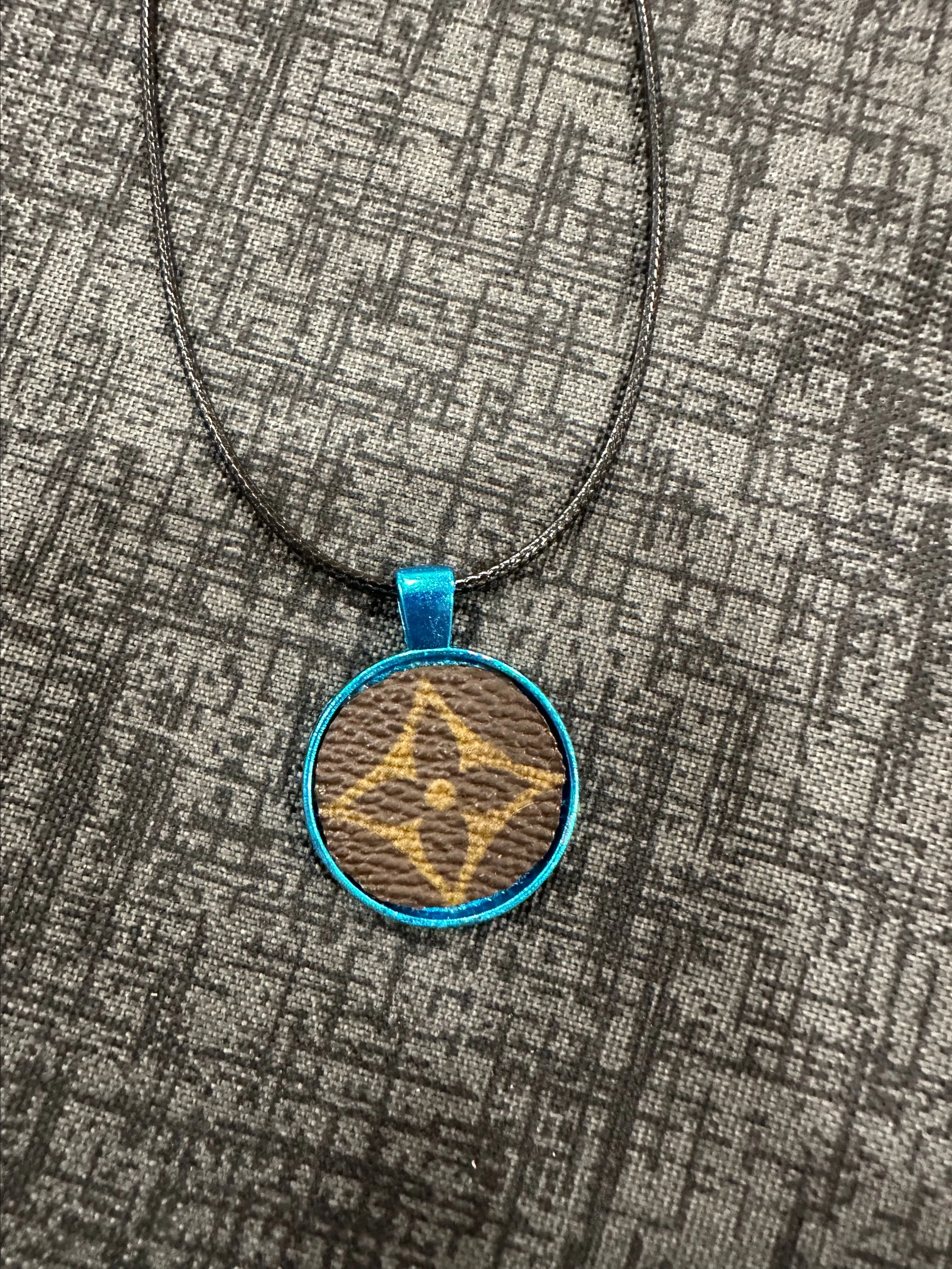 Product image for 0.	Necklace with upcycled LV inlay on charm