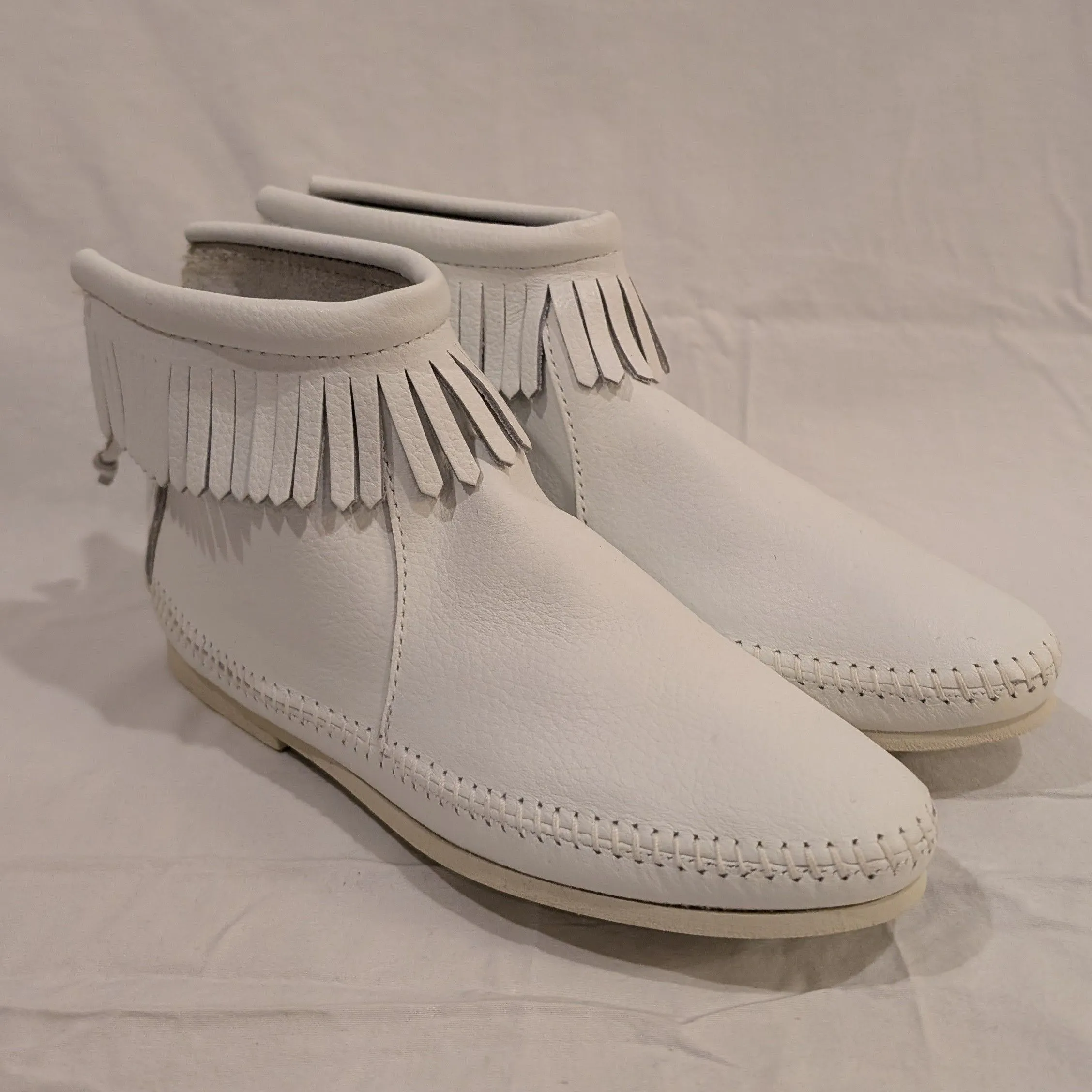 Product image for 60s Deadstock White Moccasin Booties with Fringe and Zip up Back