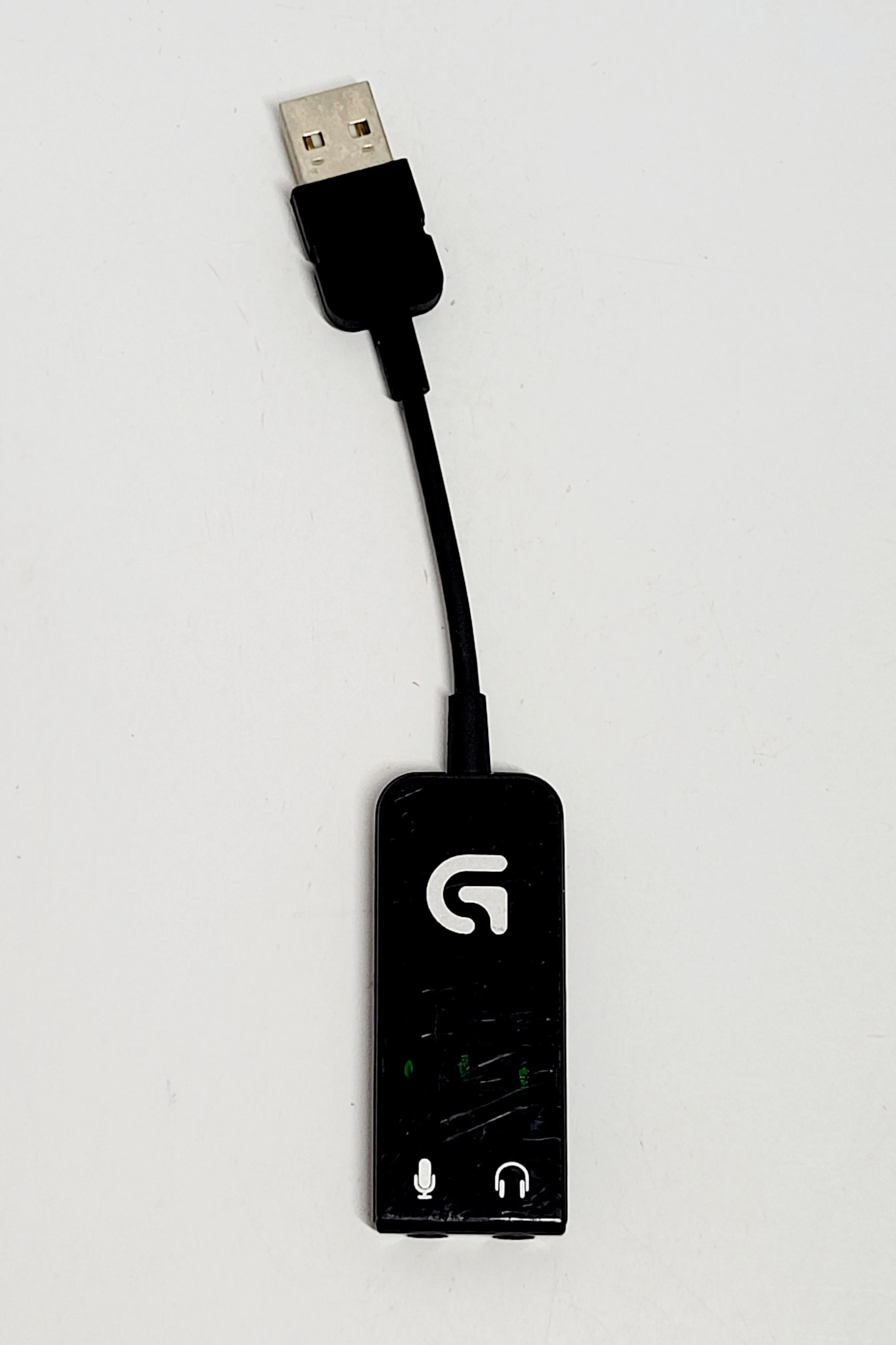 Product image for Logitech G430 Surround Sound USB Adapter Model A-00061 7.1 Surround Sound 3.5 mm. The image shows a 