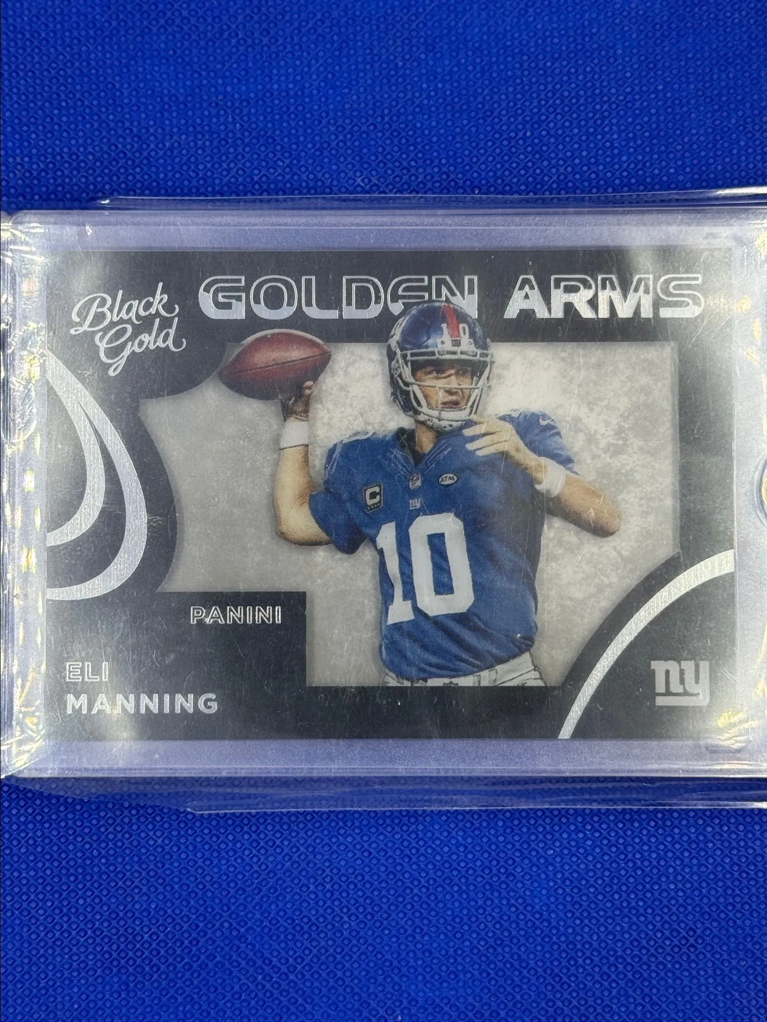 Product image for 2015 Panini Black Gold - Golden Arms #GA-10 Eli Manning /99