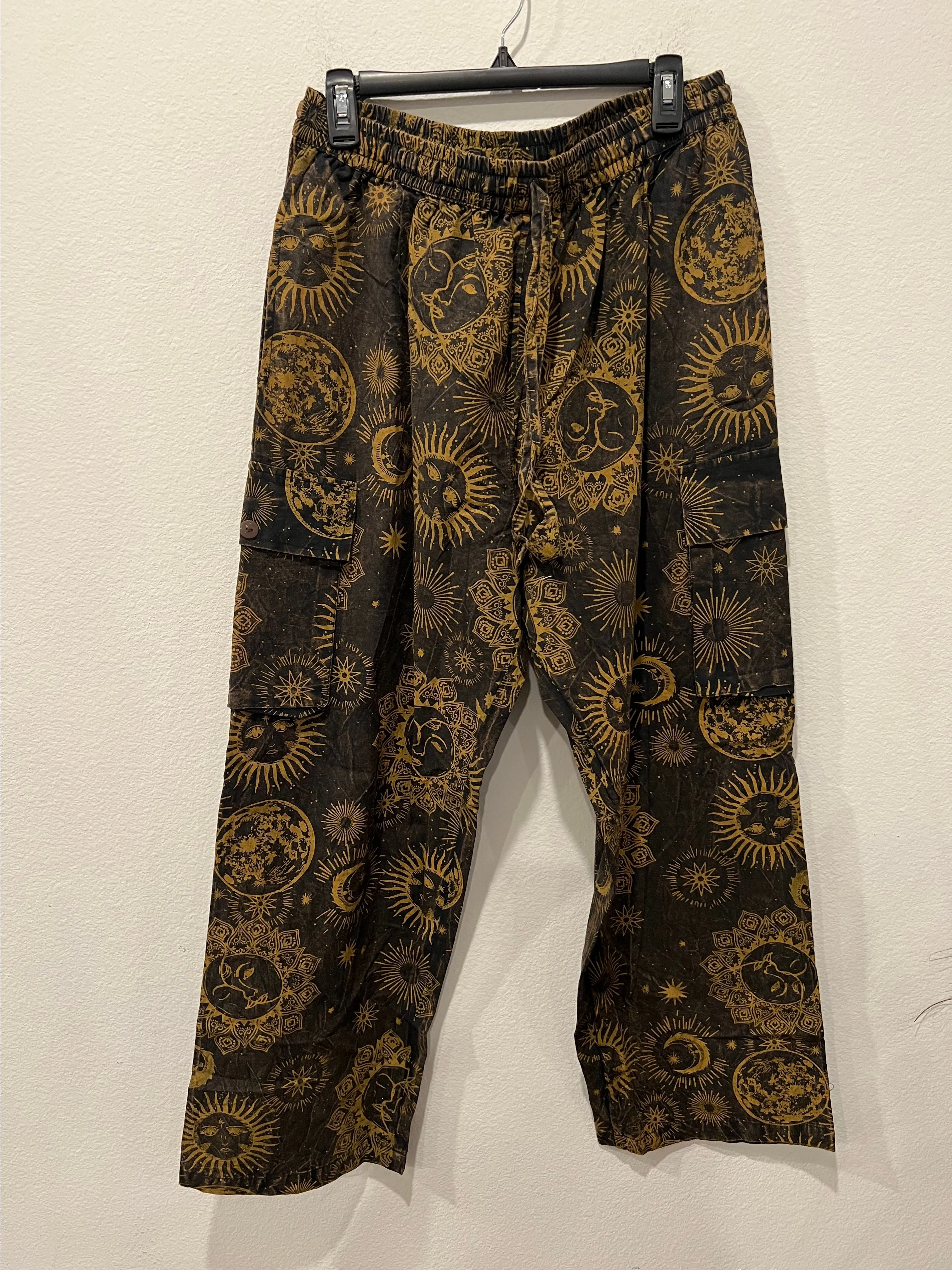 Product image for Black and Gold Patterned Pants Size M/L by Kathmandu