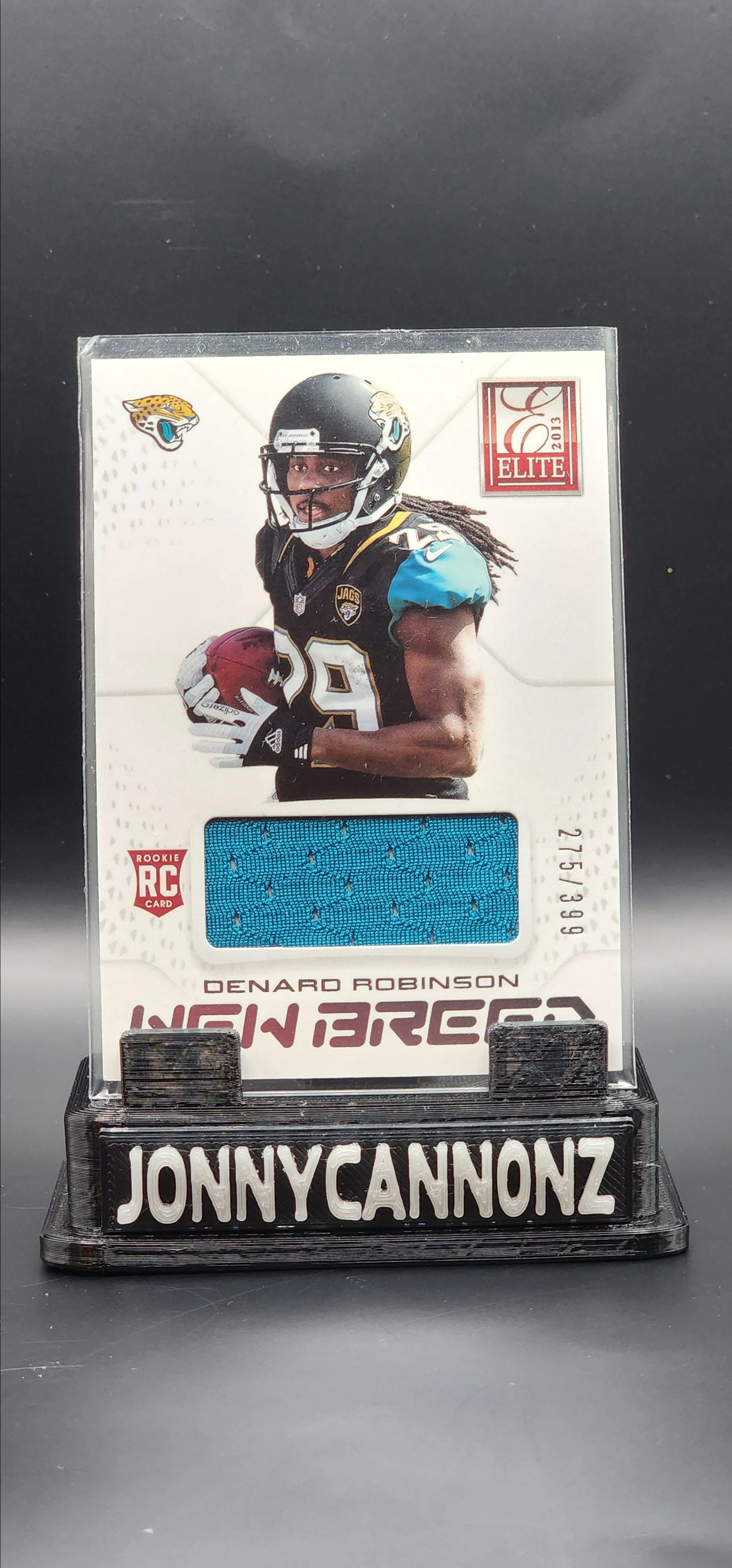 Product image for Denard Robinson - Jacksonville Jaguars - "RC" - 2013 - Elite - "Player Worn" Patch"