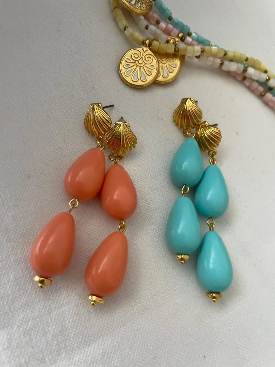 Product image for orange tear drop earrings