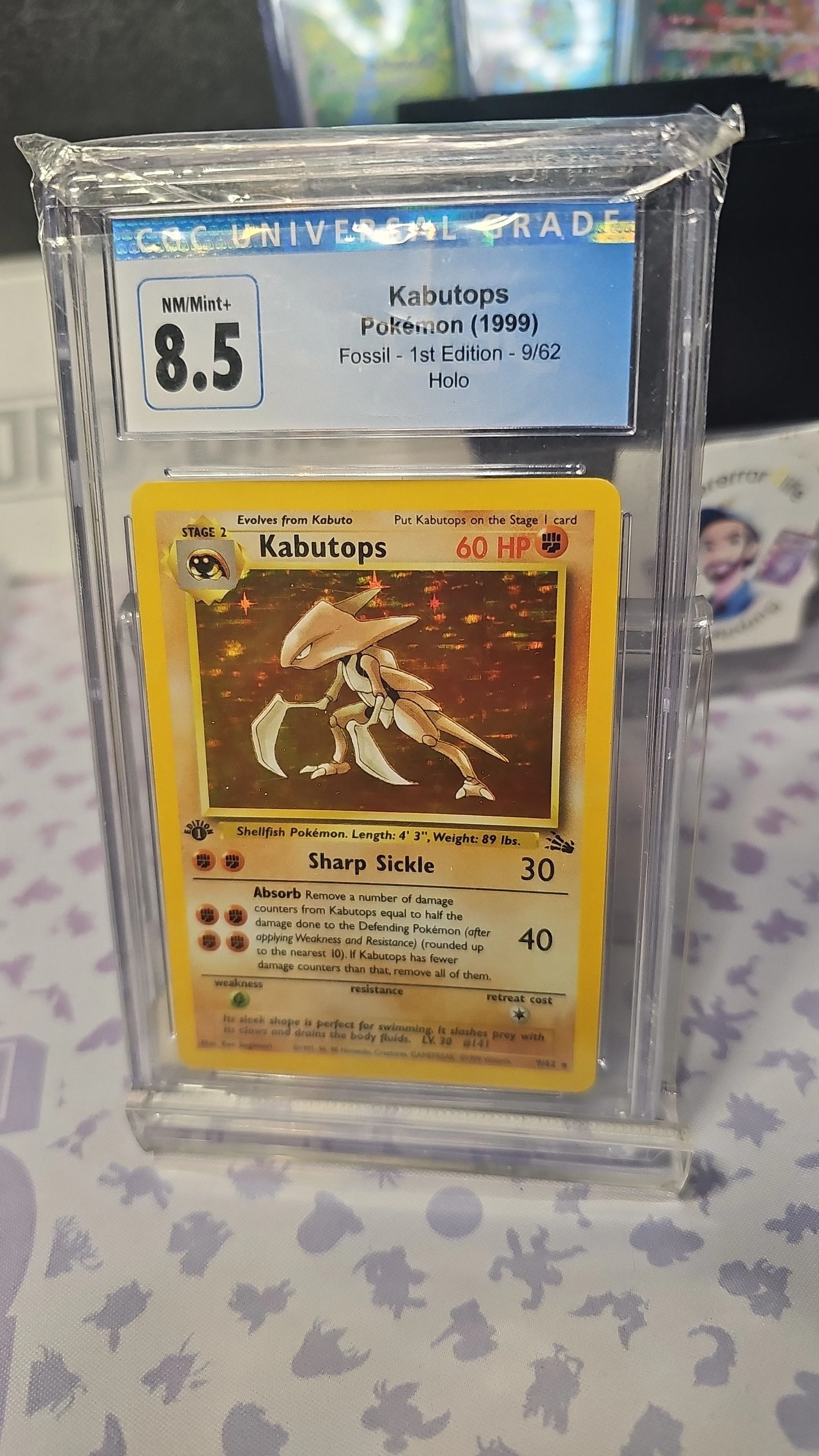 Product image for Holo 1st edition Fossil Kabutops CGC 8.5