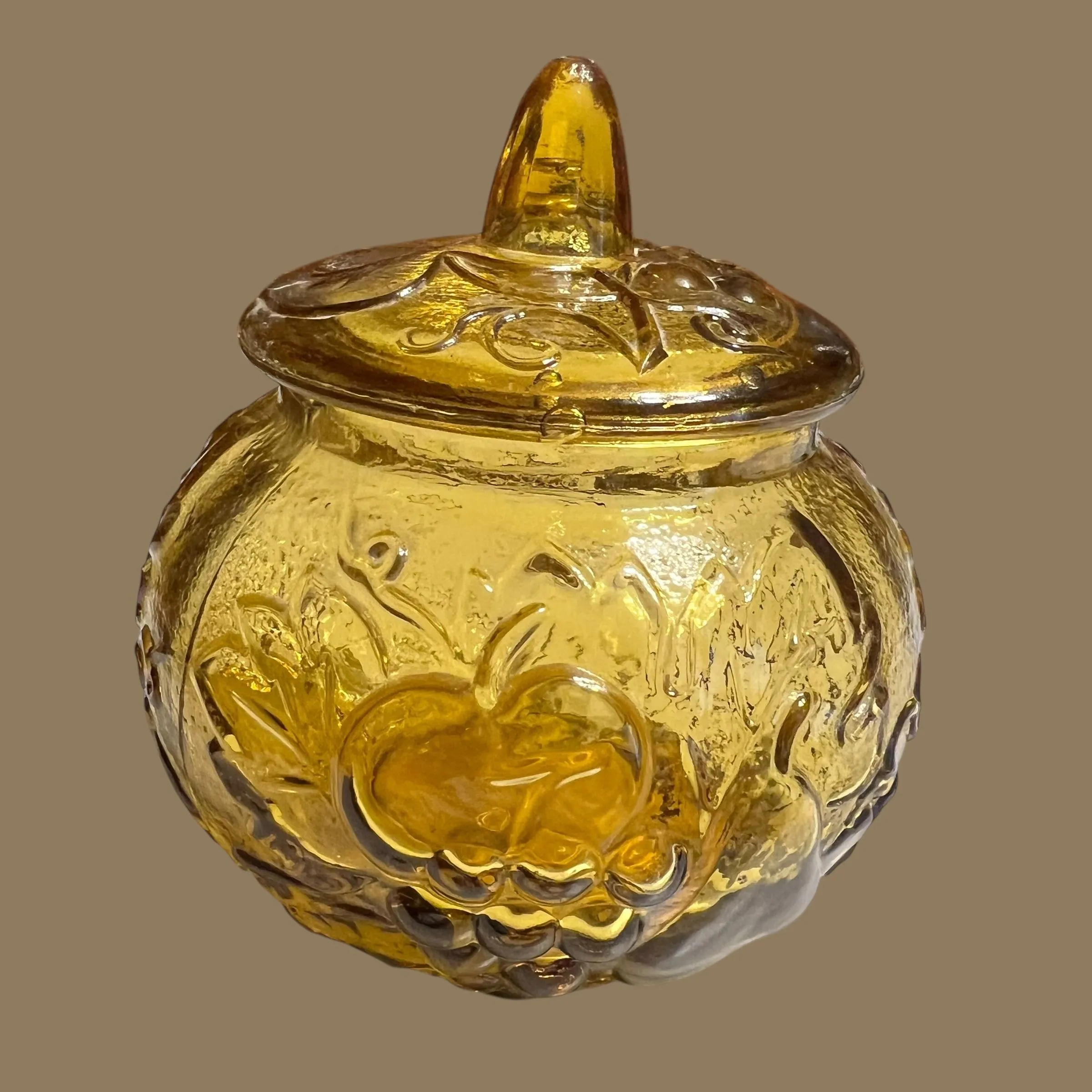 Product image for 228 round amber apothecary lid fruit motif jar, 7" x 5.5"