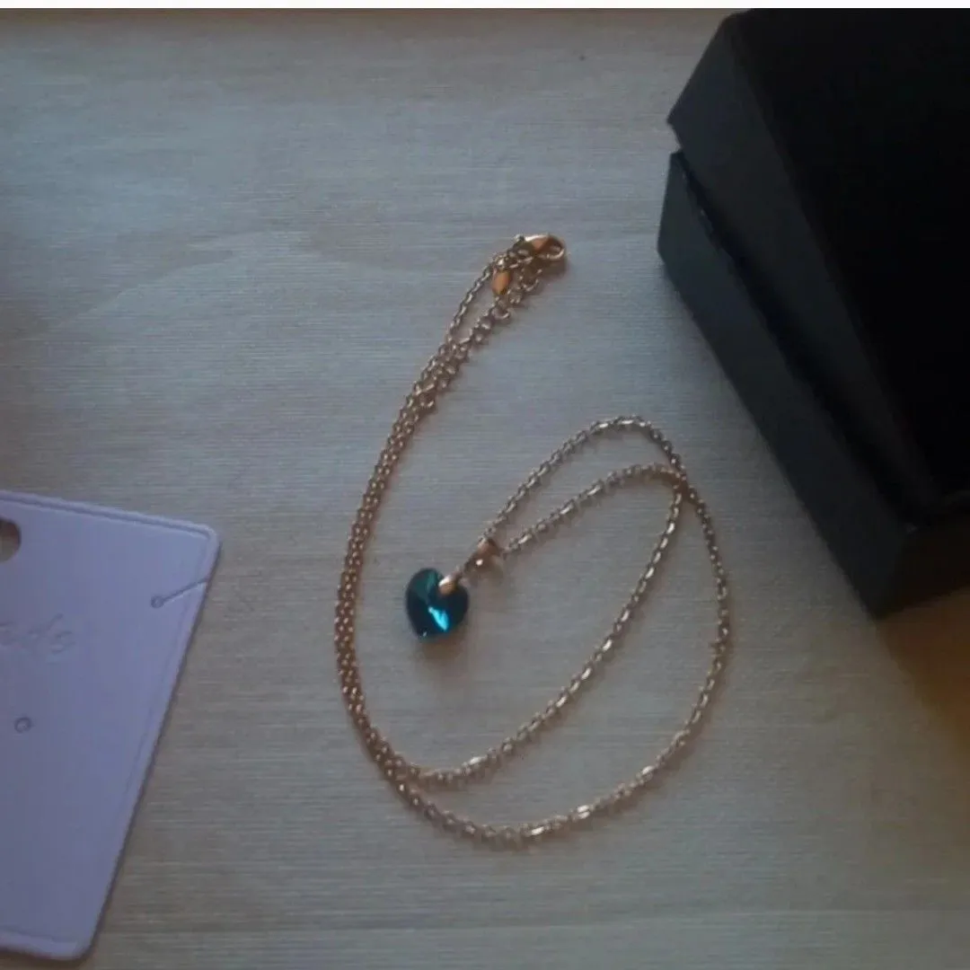 Product image for blue heart gold tone necklace 