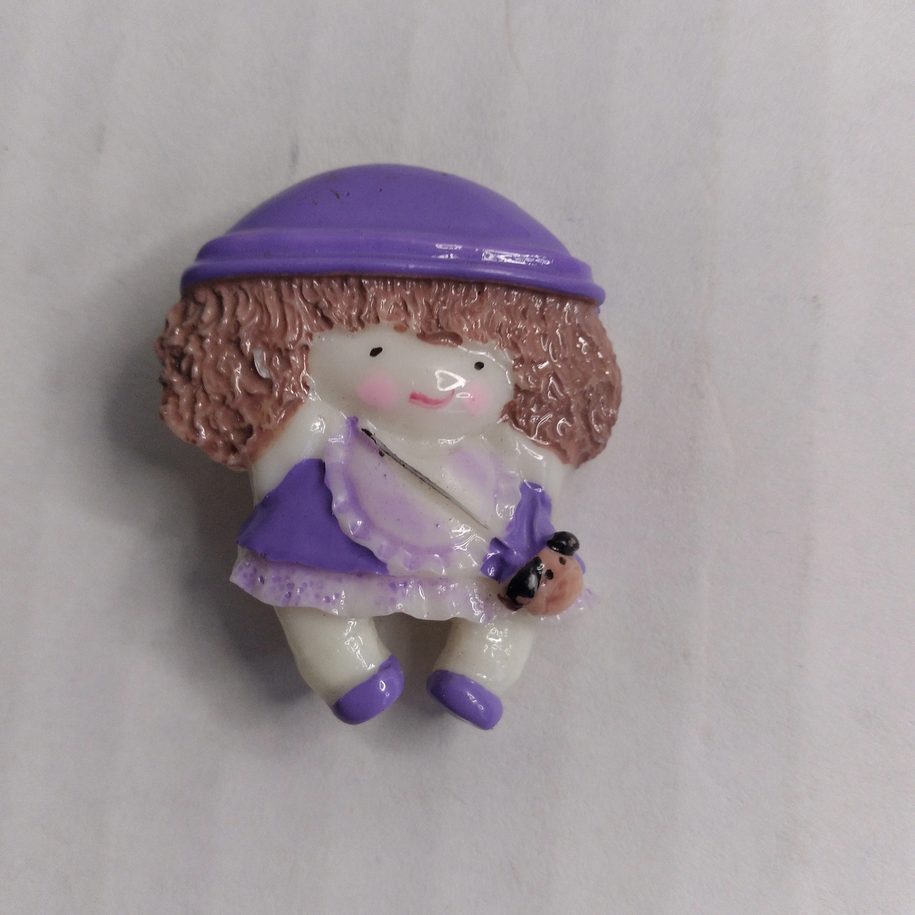 Product image for Little Girl Waring Purple Hat