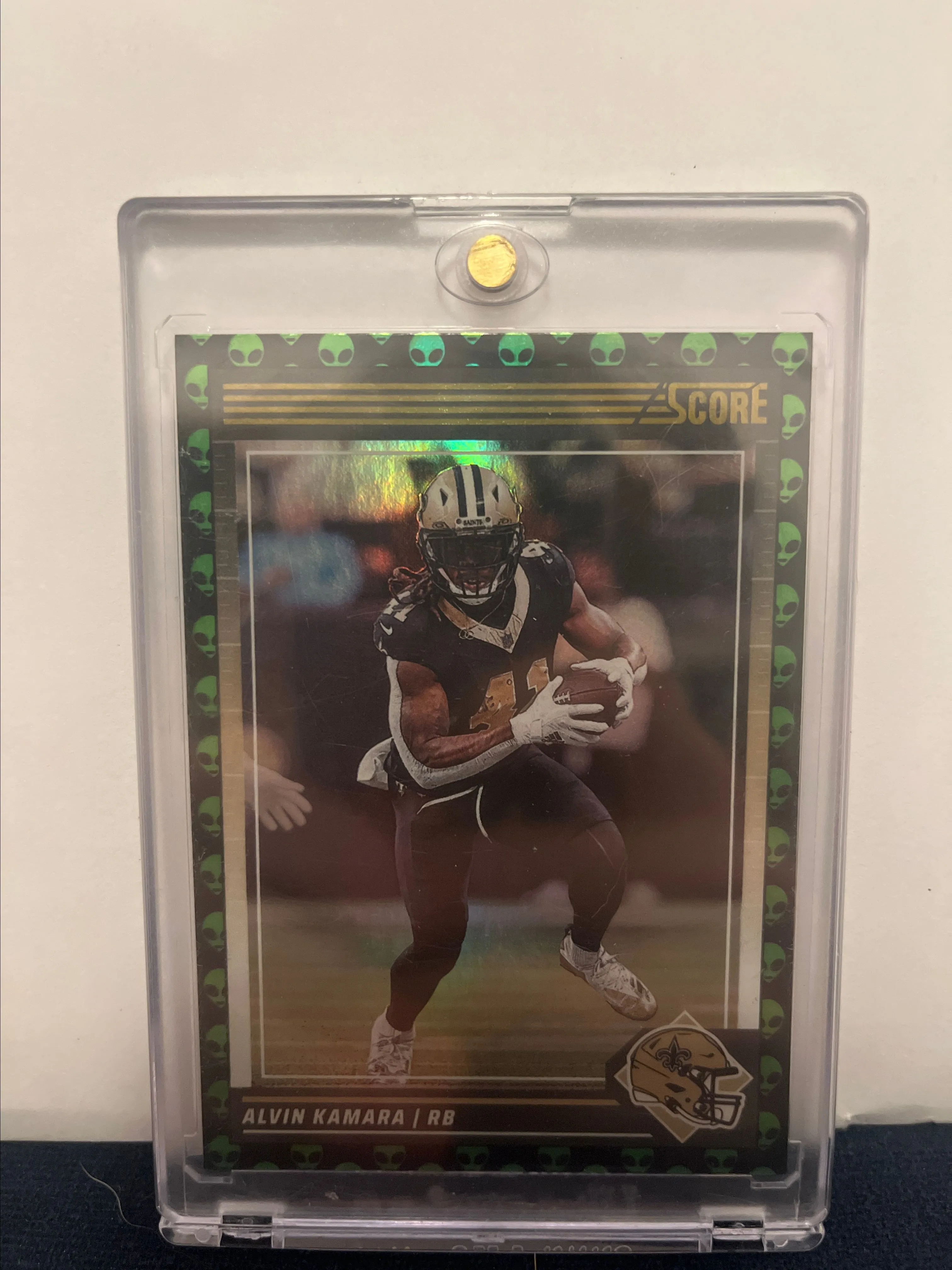 Product image for Alvin Kamara EXTRATERRESTRIAL Alien 👽 2024 Panini Score SSP CASE HIT! #203