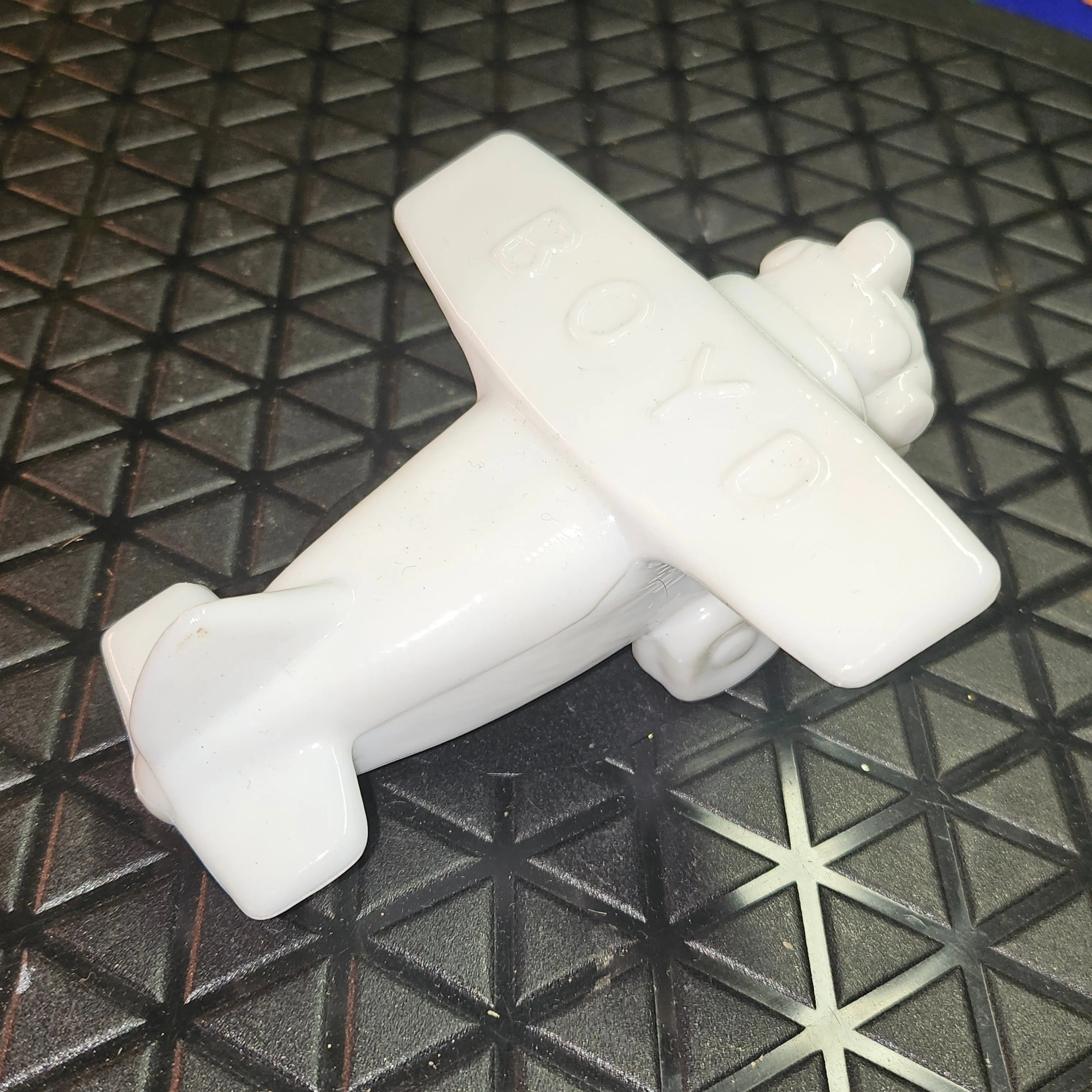 Product image for Boyds Crystal Art Glass Logo Dealer Sign Advertisement Airplane in "Columbus White" 1992 2" × 4"