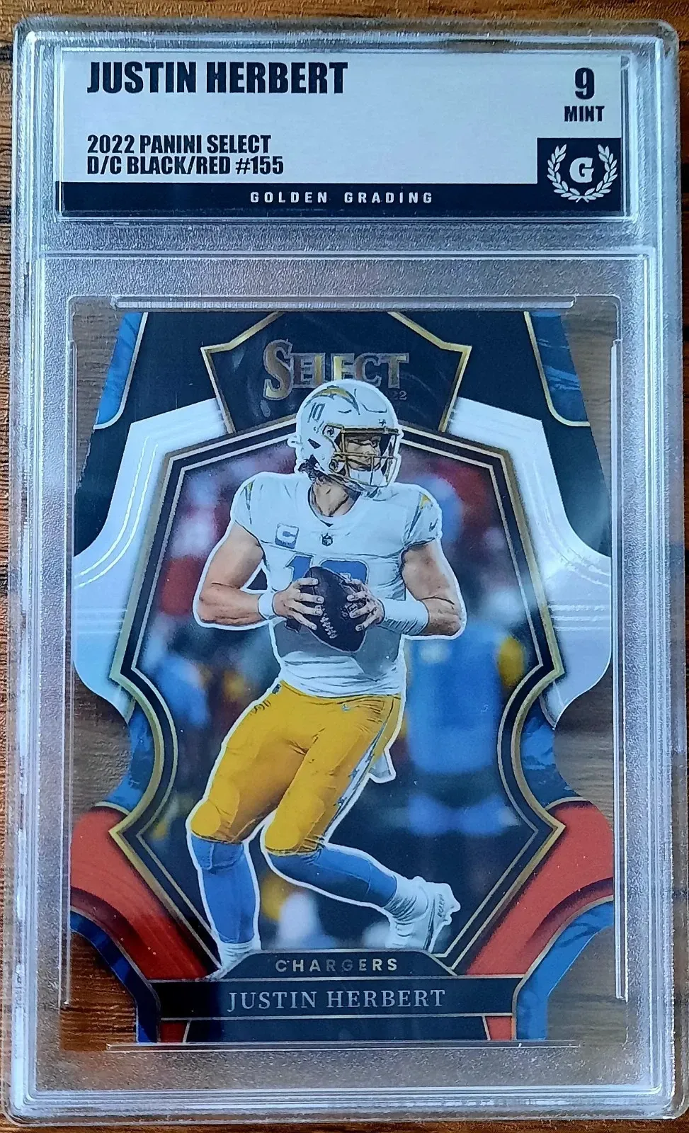 Product image for Justin Herbert 2022 Panini Select Premier Level #155 Black & Red Die Cut Prizm Golden Grading (GG) 9 Mint