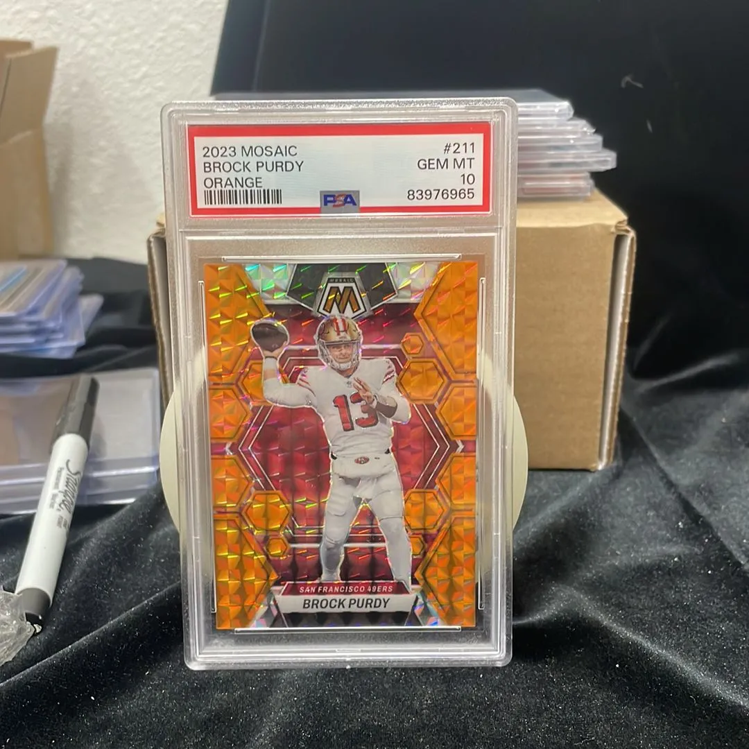 Product image for 2023 Panini Mosaic Brock Purdy 211 Orange PSA GEM MT 10