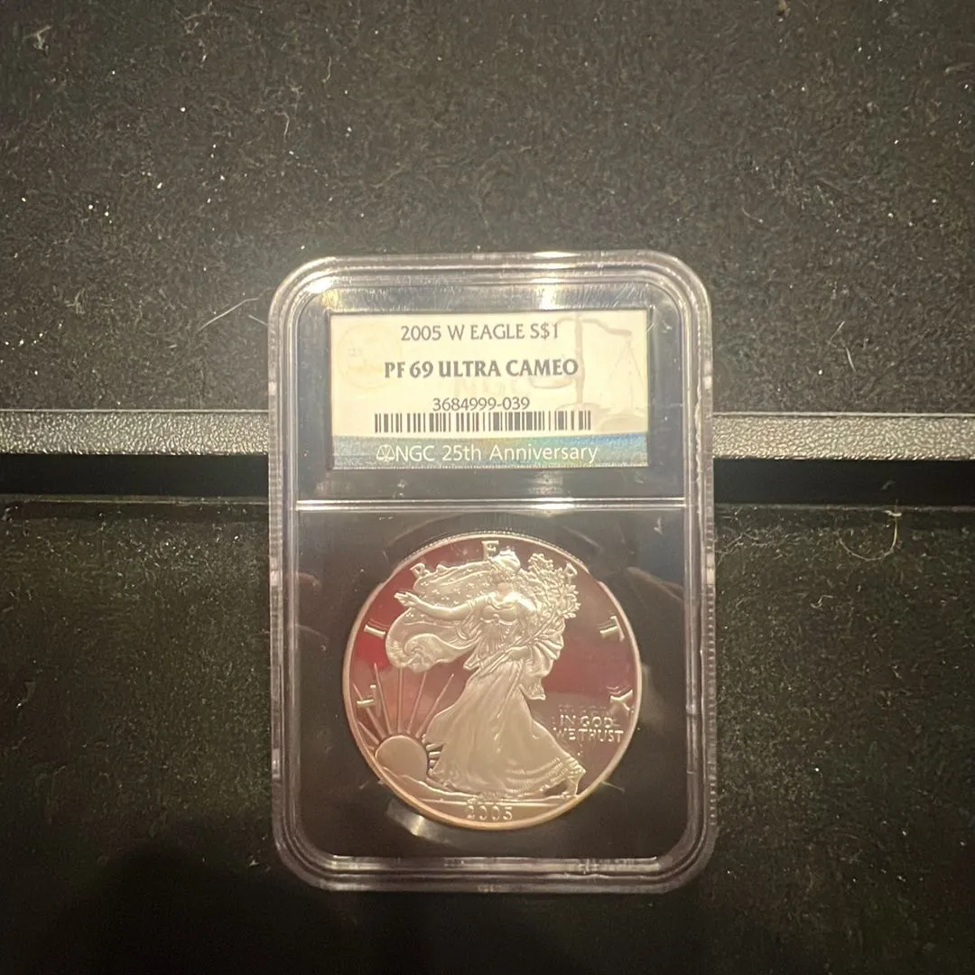 Product image for 2005 W NGC Proof 69 Ultra Cameo American Silver Eagle Black Core 25th anniversary