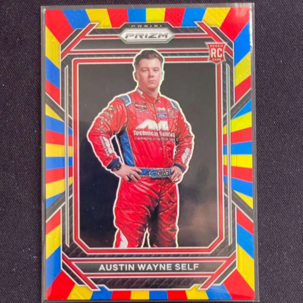 Product image for 2023 Panini Prizm Racing #22 Austin Wayne Self Rainbow Prizm /24