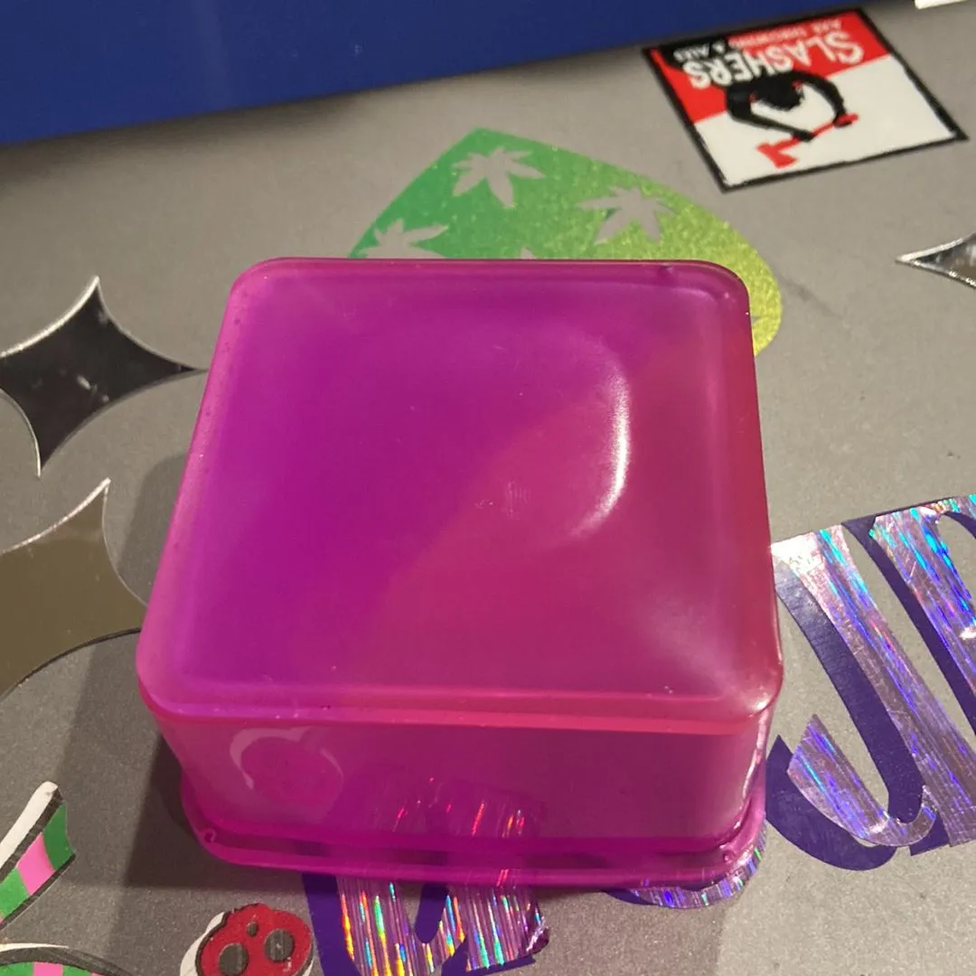 Product image for Epoxy resin pink and purple square glow in the dark container